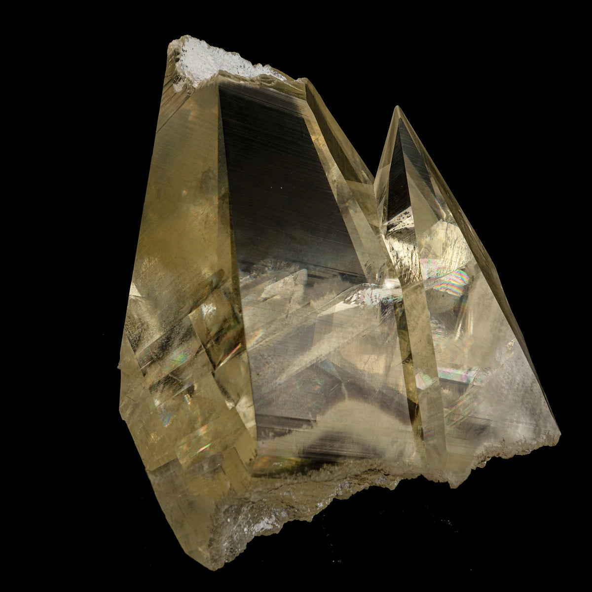 Calcite with champagne color, supreme clarity, and rainbows from light refraction. Museum quality natural specimen discovered near Jalgaon, accidentally, in a well pocket being drilled on farmland.