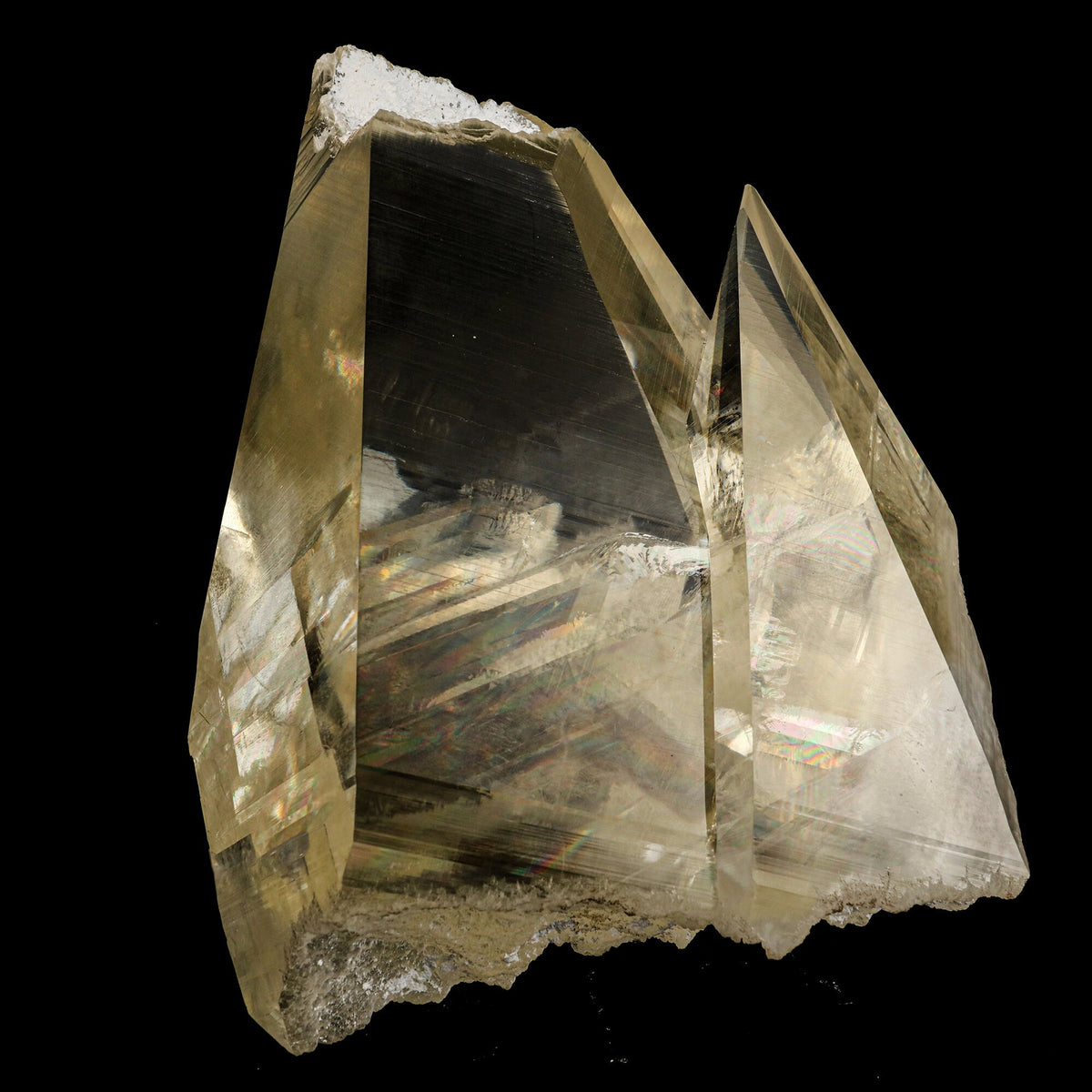 Calcite with champagne color, supreme clarity, and rainbows from light refraction. Museum quality natural specimen discovered near Jalgaon, accidentally, in a well pocket being drilled on farmland.