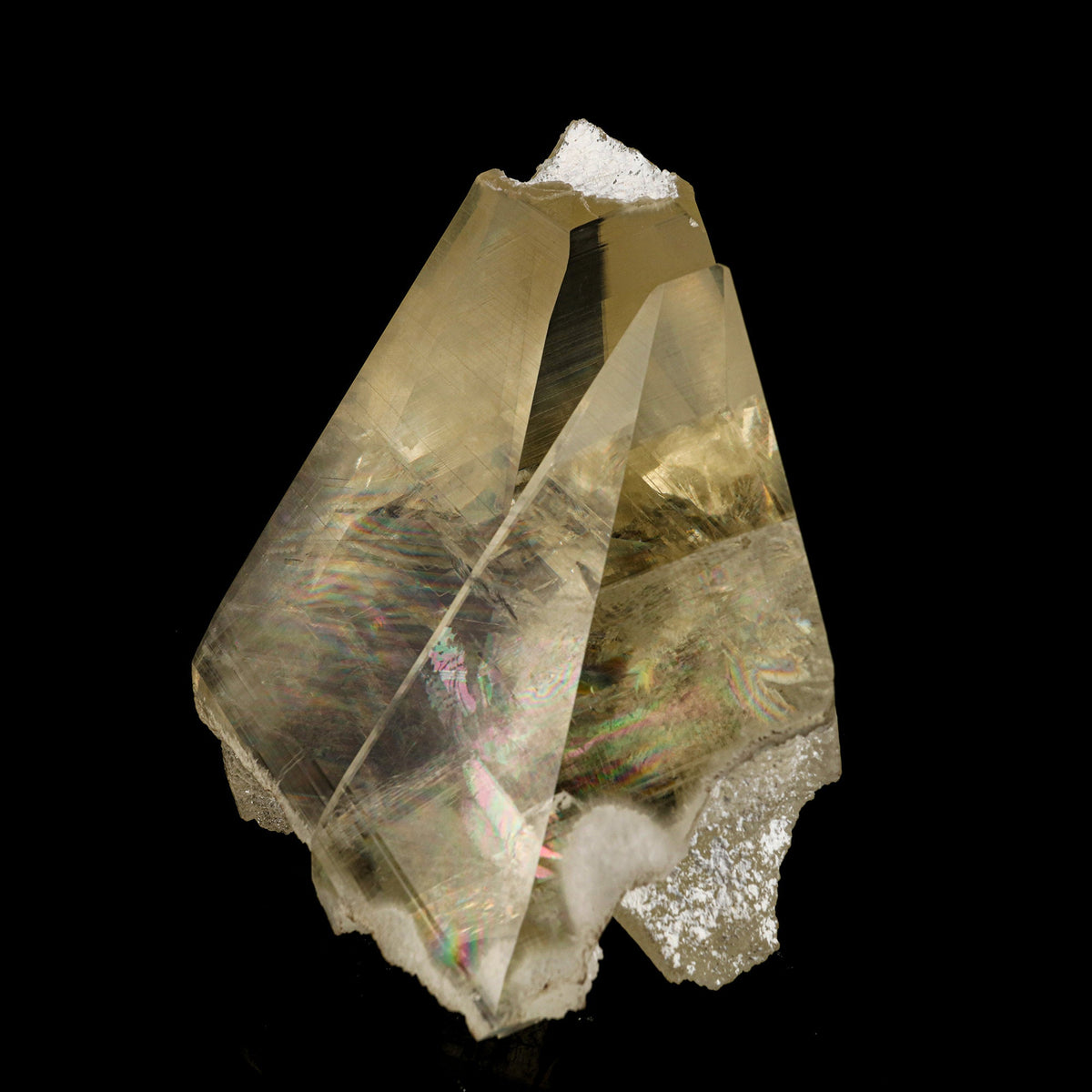 Calcite with champagne color, supreme clarity, and rainbows from light refraction. Museum quality natural specimen discovered near Jalgaon, accidentally, in a well pocket being drilled on farmland.