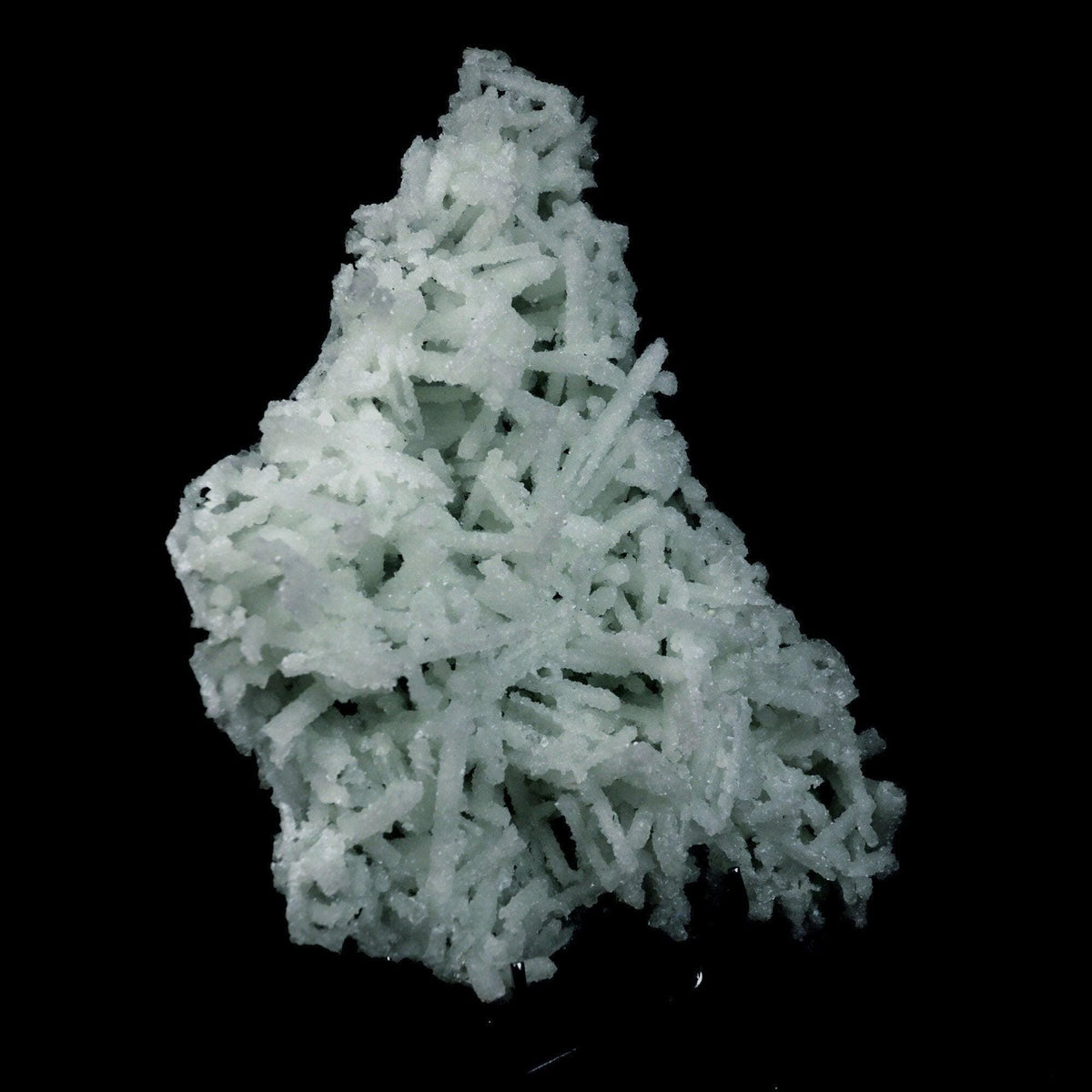Prehnite Pseudomorphed Rare Find Natural Mineral Specimen # B 4714  https://www.superbminerals.us/products/prehnite-pseudomorphed-rare-find-natural-mineral-specimen-b-4714  Features: Pretty mint-green prehnite has pseudomorphed elongated laumontite c