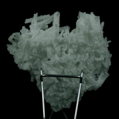 Prehnite Rare Find Natural Mineral Specimen # B 4754  https://www.superbminerals.us/products/prehnite-rare-find-natural-mineral-specimen-b-4754  Features: A coveted jackstraw cluster of elongated laumontite crystals that pseudomorphed from mint-green