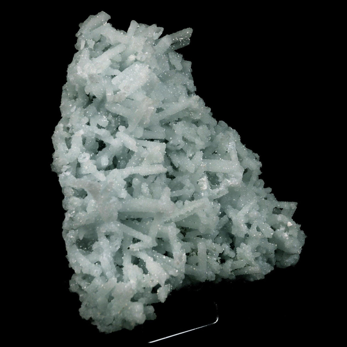 Prehnite Rare Find Natural Mineral Specimen # B 4757  https://www.superbminerals.us/products/prehnite-rare-find-natural-mineral-specimen-b-4757  Features: A coveted jackstraw cluster of elongated laumontite crystals that pseudomorphed from mint-green
