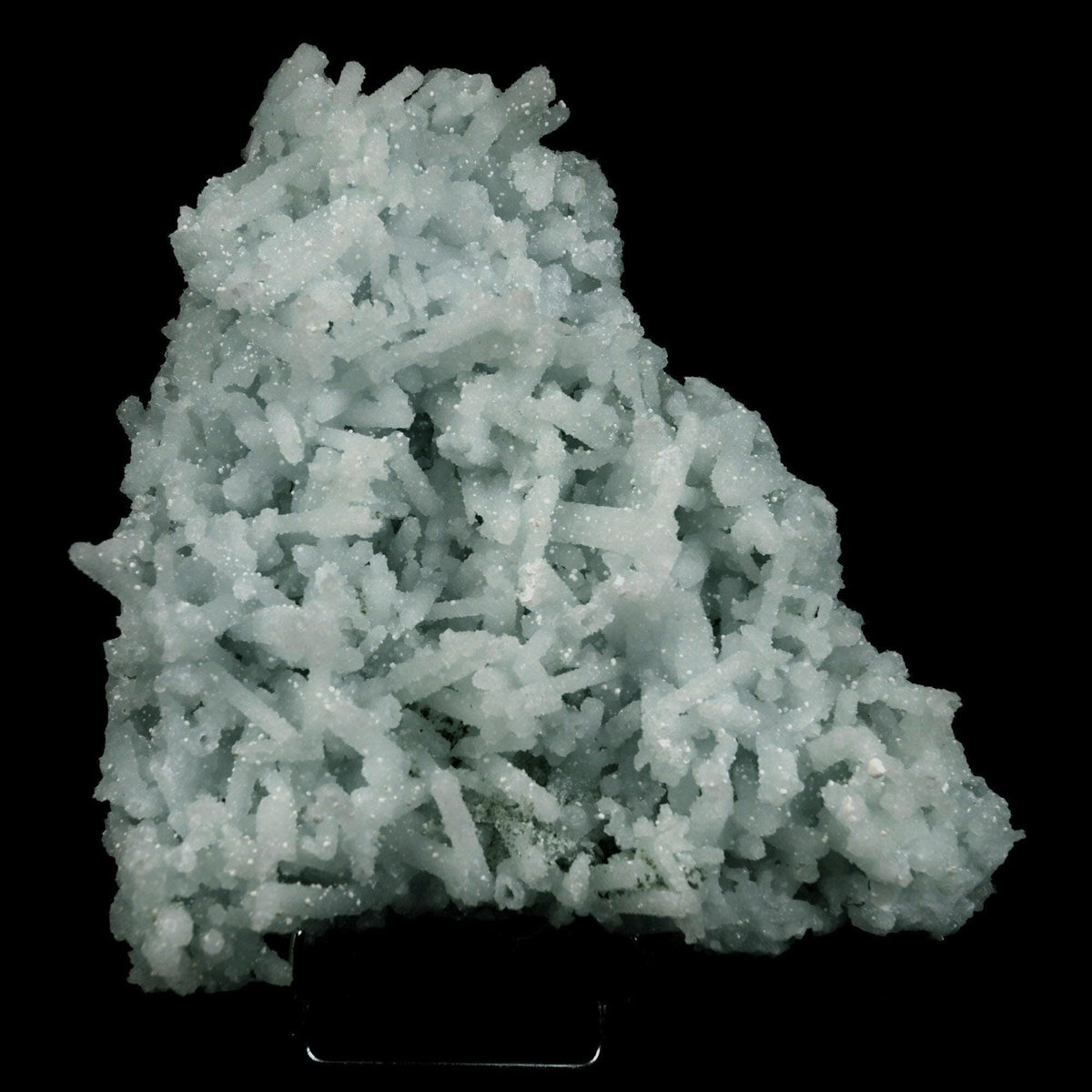 Prehnite Rare Find Natural Mineral Specimen # B 4757  https://www.superbminerals.us/products/prehnite-rare-find-natural-mineral-specimen-b-4757  Features: A coveted jackstraw cluster of elongated laumontite crystals that pseudomorphed from mint-green