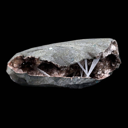 Scolecite Sprays Inside Geode Natural Mineral Specimen # B 4650  https://www.superbminerals.us/products/scolecite-sprays-inside-geode-natural-mineral-specimen-b-4650  Features: A lovely item with a geode lined with beige, glossy Heulandite crystals.