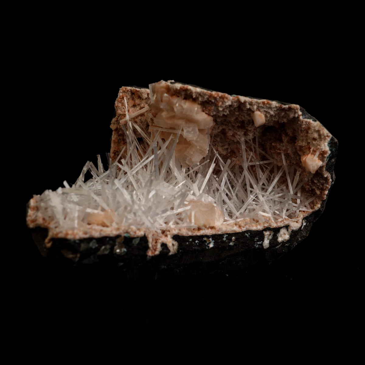 Scolecite Sprays Inside Heulandite Geode Natural Mineral Specimen # B…  https://www.superbminerals.us/products/scolecite-sprays-inside-heulandite-geode-natural-mineral-specimen-b-5059  Features: A big, free-standing Geode bordered with peach-colored