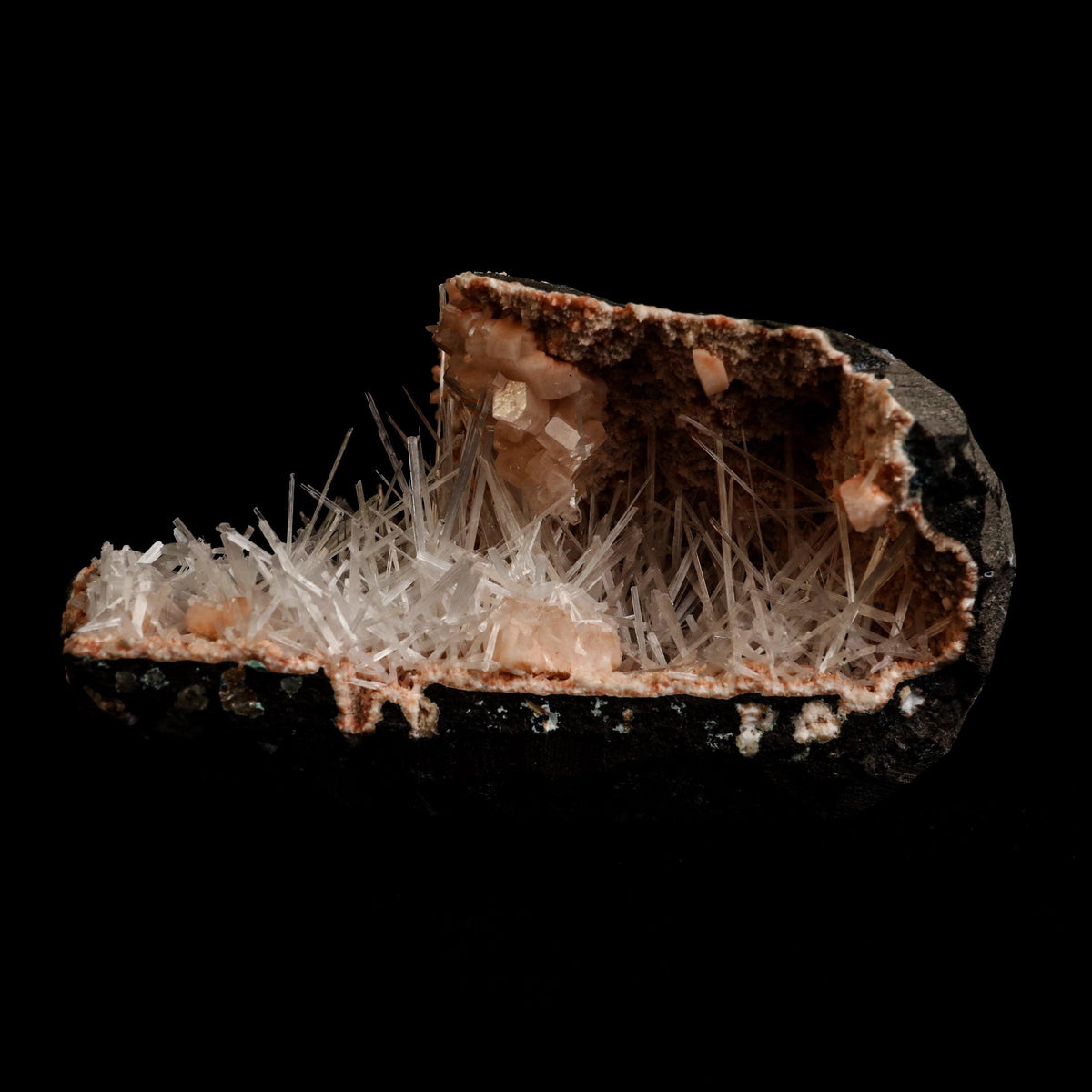 Scolecite Sprays Inside Heulandite Geode Natural Mineral Specimen # B…  https://www.superbminerals.us/products/scolecite-sprays-inside-heulandite-geode-natural-mineral-specimen-b-5059  Features: A big, free-standing Geode bordered with peach-colored