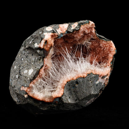 Scolecite Sprays Inside Heulandite Geode Natural Mineral Specimen # B…  https://www.superbminerals.us/products/scolecite-sprays-inside-heulandite-geode-natural-mineral-specimen-b-5089  Features: A big, free-standing Geode bordered with peach-colored