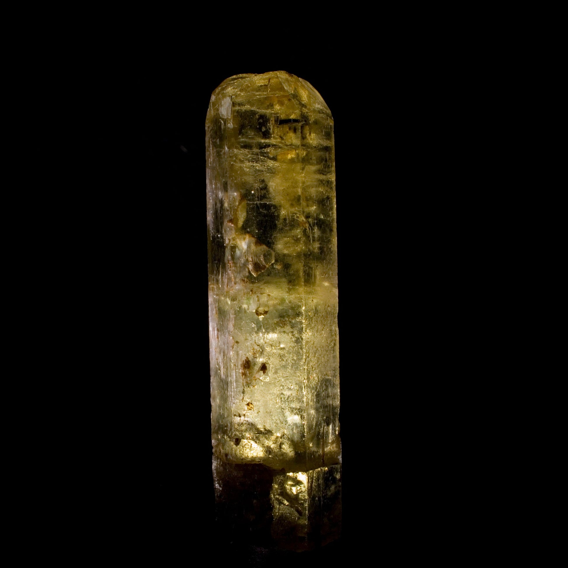 Heliodor standing tall, champagne-colored, all natural, and terminated. Exceptionally rare coming from India, as it is not commonly found there.