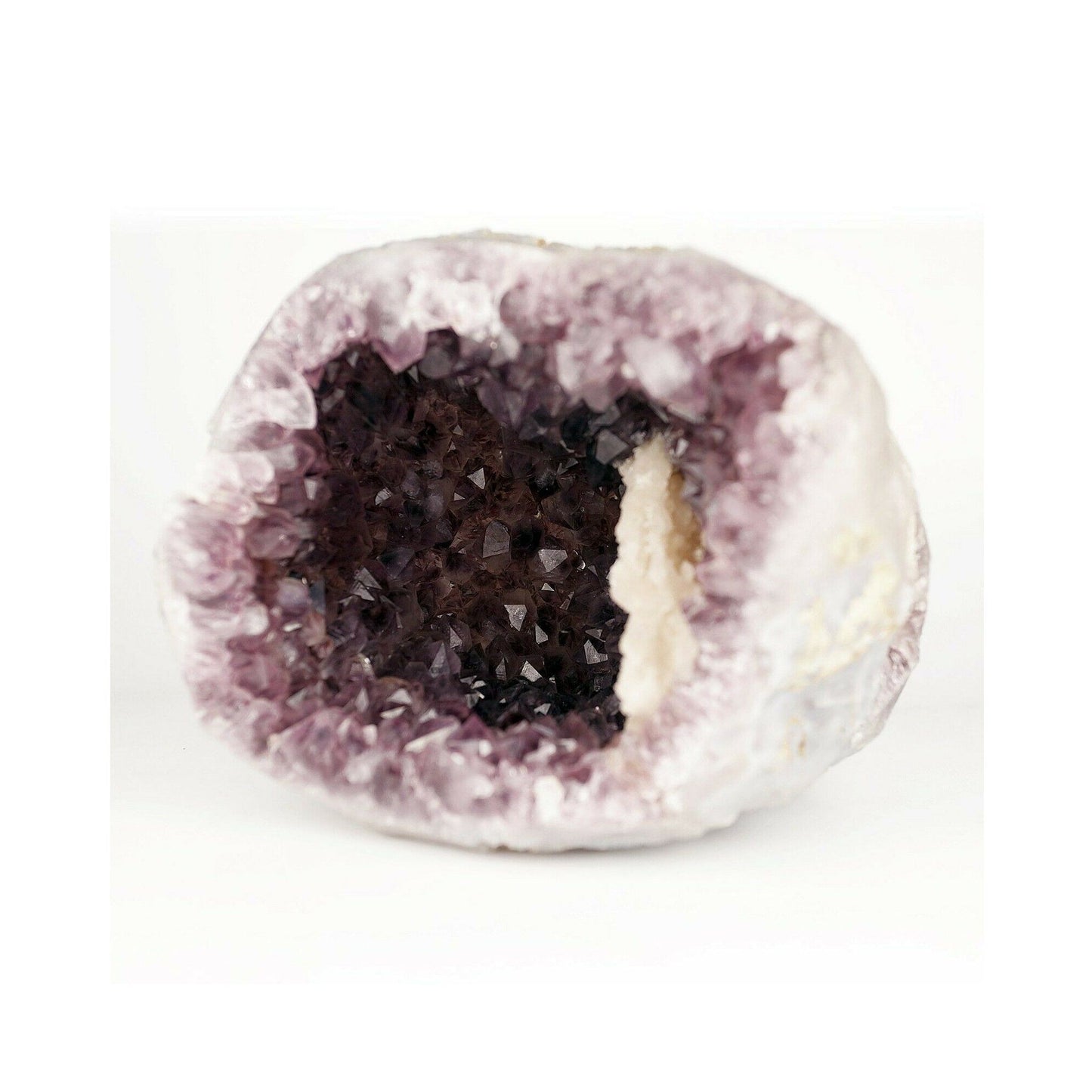 Amethyst purple geod formation with Calcite Natural Mineral Specimen # b3669 An Amethyst Quartz Geode from India! The Amethyst is lustrous and a unique purple color on a colorless Chalcedony. There is banding clearly present on the opening edge, and there is a unique thin reddish-brown streak around the inside of the geode due to a self-healed fracture on the outside of the geode.
