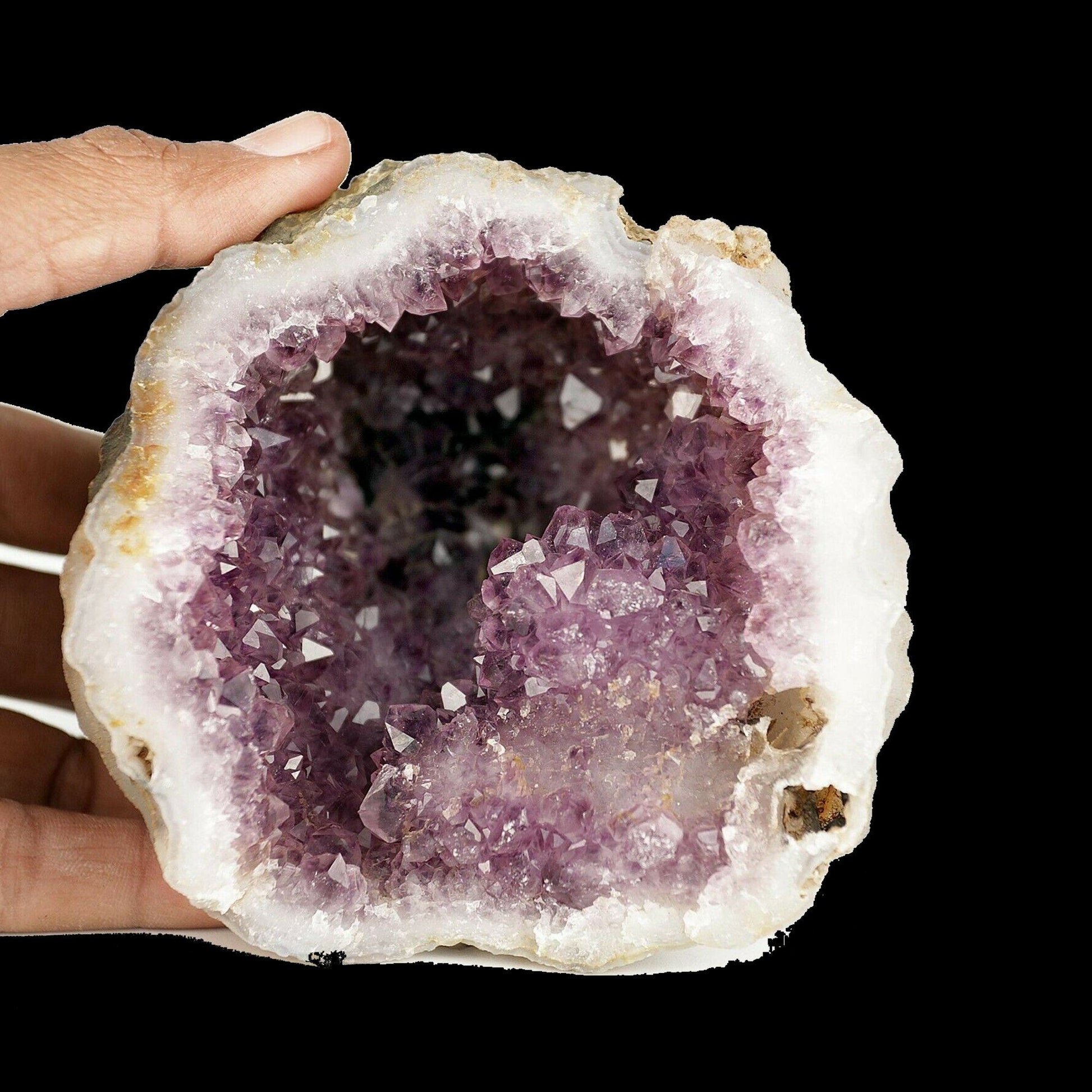 Amethyst purple cluster Natural Mineral Specimen # B 3666  https://www.superbminerals.us/products/amethyst-purple-cluster-natural-mineral-specimen-b-3666  Features A Geode lined with lustrous, translucent, deep purple Amethyst Quartz crystals. The intense purple found in India Amethyst is unlike anything else available, and this piece is no exception. Very aesthetic with amazing color and luster, and a great value. In excellent condition. Primary Mineral(s): AmethystS
