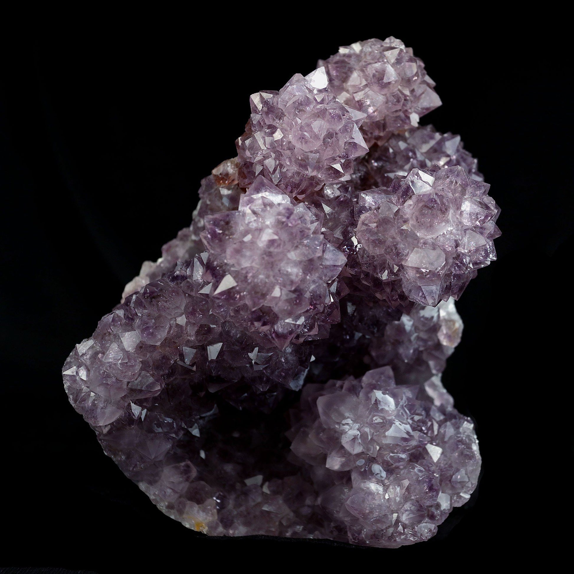 Amethyst Purple Color Crystal Natural Mineral Specimen # B 4092  https://www.superbminerals.us/products/amethyst-purple-color-crystal-natural-mineral-specimen-b-4092  Features:A very large Geode fragment lined with black bubbled&nbsp; Chalcedony, partially coated with a sparkling colorless Chalcedony druse. There is another, smaller bubuled crystal near a corner, but it’s the pristine, centered that steals the show! The luster, contrast, crystal formation and balance is outstanding