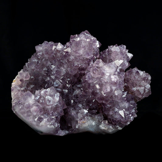 Amethyst Purple Color Crystal Natural Mineral Specimen # B 4092  https://www.superbminerals.us/products/amethyst-purple-color-crystal-natural-mineral-specimen-b-4092  Features:A very large Geode fragment lined with black bubbled&nbsp; Chalcedony, partially coated with a sparkling colorless Chalcedony druse. There is another, smaller bubuled crystal near a corner, but it’s the pristine, centered that steals the show! The luster, contrast, crystal formation and balance is outstanding