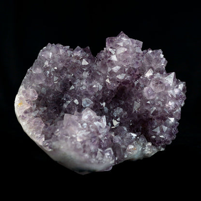 Amethyst Purple Color Crystal Natural Mineral Specimen # B 4092  https://www.superbminerals.us/products/amethyst-purple-color-crystal-natural-mineral-specimen-b-4092  Features:A very large Geode fragment lined with black bubbled&nbsp; Chalcedony, partially coated with a sparkling colorless Chalcedony druse. There is another, smaller bubuled crystal near a corner, but it’s the pristine, centered that steals the show! The luster, contrast, crystal formation and balance is outstanding