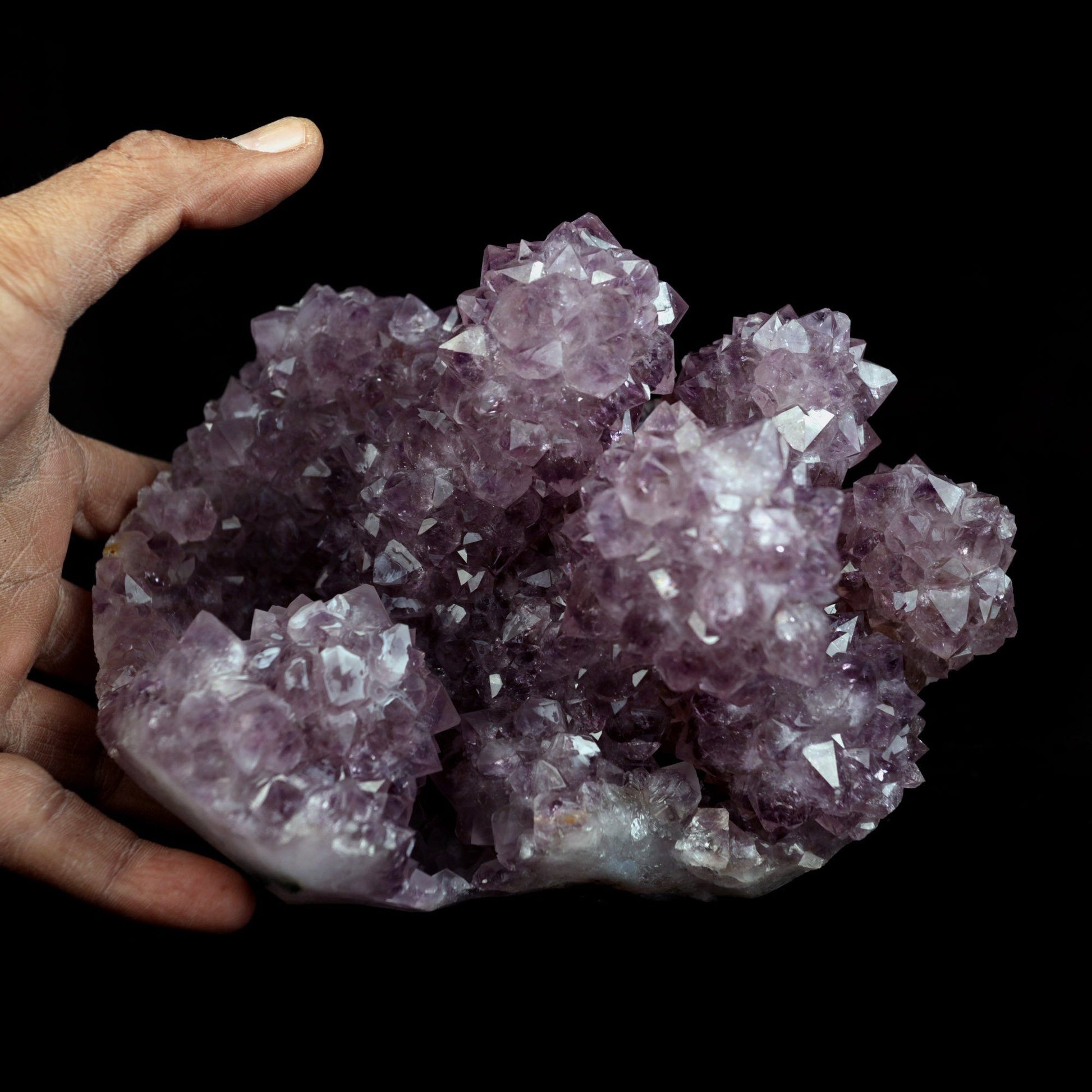 Amethyst Purple Color Crystal Natural Mineral Specimen # B 4092  https://www.superbminerals.us/products/amethyst-purple-color-crystal-natural-mineral-specimen-b-4092  Features:A very large Geode fragment lined with black bubbled&nbsp; Chalcedony, partially coated with a sparkling colorless Chalcedony druse. There is another, smaller bubuled crystal near a corner, but it’s the pristine, centered that steals the show! The luster, contrast, crystal formation and balance is outstanding