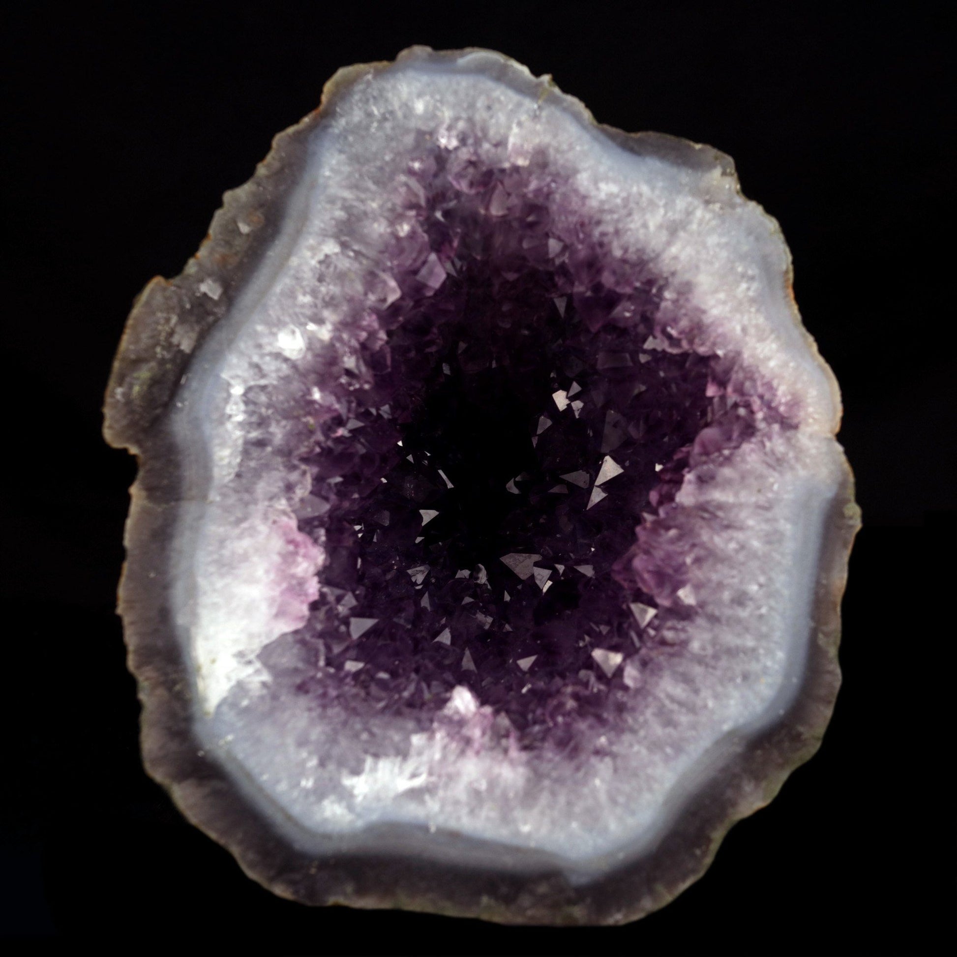 Amethyst Purple Crystals Geode (2 Halves ) Natural Mineral Specimen # …  https://www.superbminerals.us/products/amethyst-purple-crystals-geode-2-halves-natural-mineral-specimen-b-4816  Features: An extremely stylish piece highlighting two parts of an Amethyst Geode. The Amethyst crystals are on a Quartz which itself is on layers of clear, dark/blue Chalcedony. The tone, shine and differentiation is astonishing. Furthermore, to see two coordinated parts showed is an eye-catcher. 