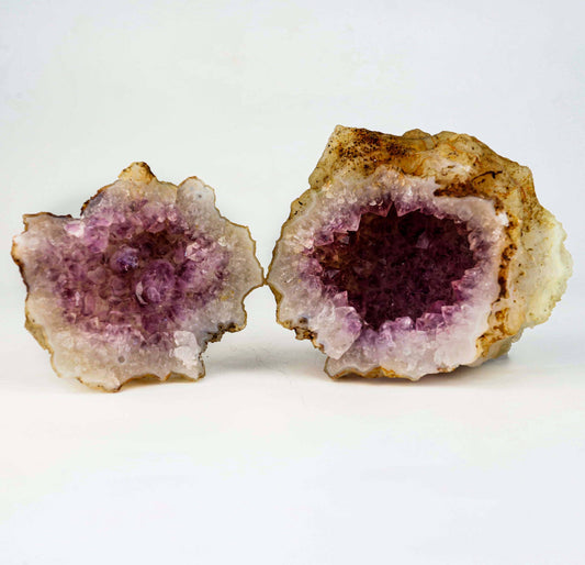 Amethyst Purple Crystals Geode (2 Halves ) Natural Mineral Specimen #…  https://www.superbminerals.us/products/amethyst-purple-crystals-geode-2-halves-natural-mineral-specimen-b-4936  Features: An extremely stylish piece highlighting two parts of an Amethyst Geode. The Amethyst crystals are on a Quartz which itself is on layers of clear, dark/blue Chalcedony. The tone, shine and differentiation is astonishing. Furthermore, to see two coordinated parts showed is an eye-catcher. 