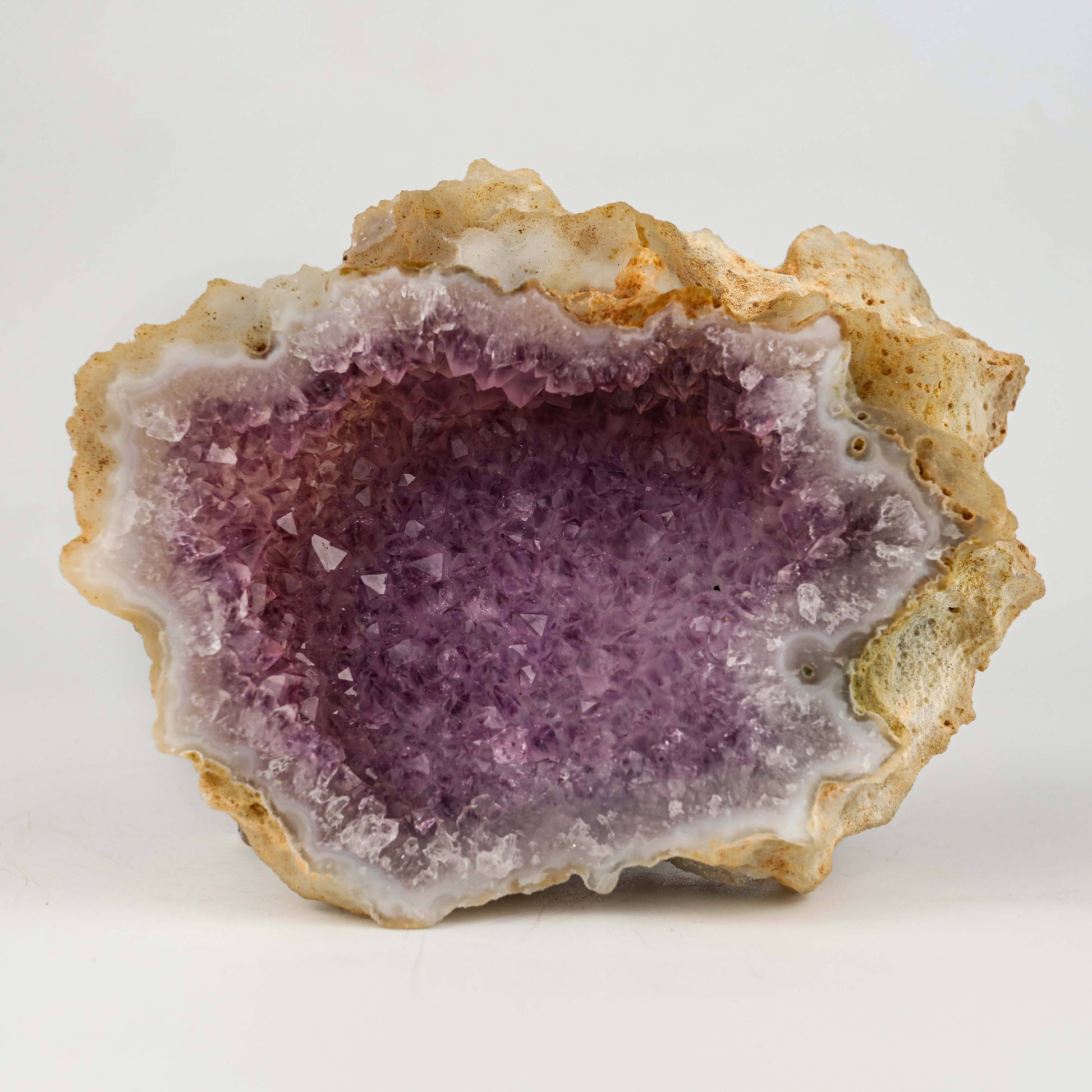Amethyst Purple Crystals Geode (2 Halves ) Natural Mineral Specimen #…  https://www.superbminerals.us/products/amethyst-purple-crystals-geode-2-halves-natural-mineral-specimen-b-4941  Features: An extremely stylish piece highlighting two parts of an Amethyst Geode. The Amethyst crystals are on a Quartz which itself is on layers of clear, dark/blue Chalcedony. The tone, shine and differentiation is astonishing. Furthermore, to see two coordinated parts showed is an eye-catcher. At the point when