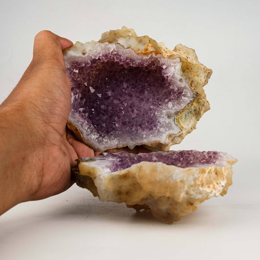 Amethyst Purple Crystals Geode (2 Halves ) Natural Mineral Specimen #…  https://www.superbminerals.us/products/amethyst-purple-crystals-geode-2-halves-natural-mineral-specimen-b-4941  Features: An extremely stylish piece highlighting two parts of an Amethyst Geode. The Amethyst crystals are on a Quartz which itself is on layers of clear, dark/blue Chalcedony. The tone, shine and differentiation is astonishing. Furthermore, to see two coordinated parts showed is an eye-catcher. At the point when