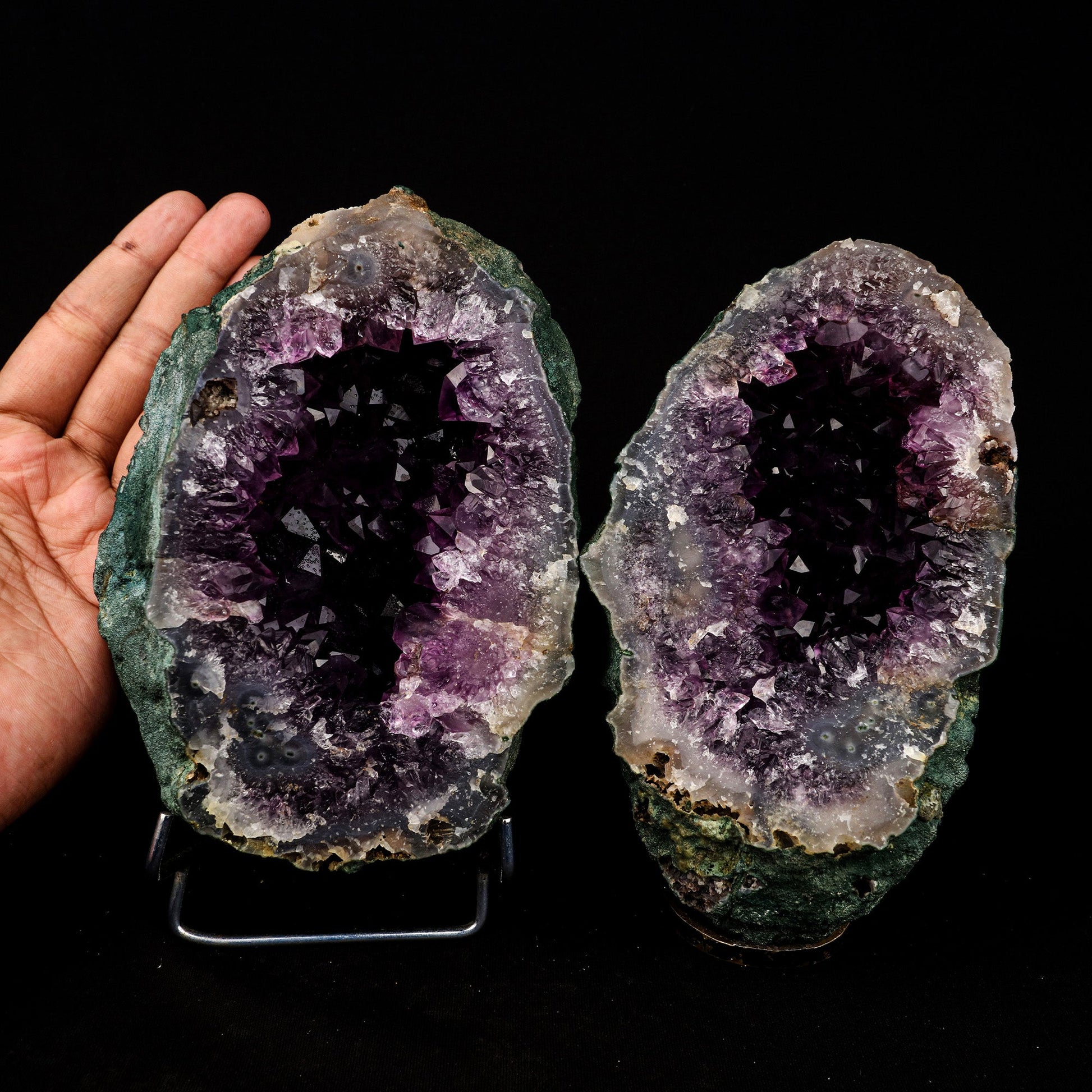 Amethyst Sprakling Two Havles Geode Natural Mineral Specimen # B 5289  https://www.superbminerals.us/products/amethyst-sprakling-two-havles-geode-natural-mineral-specimen-b-5289  Features: This essay highlights the importance of never judging a book by its cover. When you look at these two halves together, it's plain and unappealing. Even unappealing. It's a breathtaking contrast to see the sparkling, purple Amethyst crystals lining the entire chamber on both half as it splits apart!
