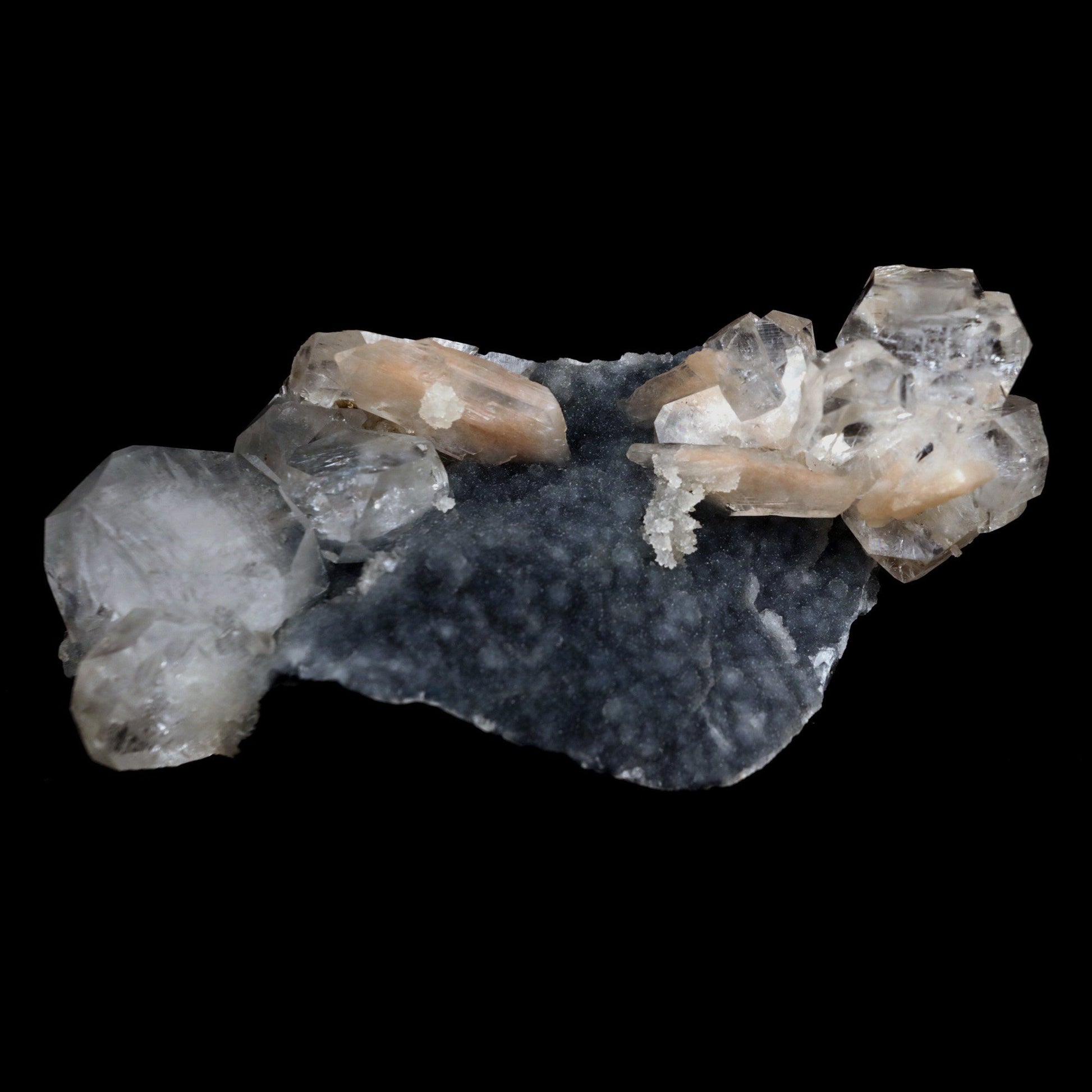 Apophyllite Cube with Stilbite on Chalcedony Natural Mineral Specimen …  https://www.superbminerals.us/products/apophyllite-cube-with-stilbite-on-chalcedony-natural-mineral-specimen-b-4916  Features: Beautiful, isolated, cubical, lustrous, gemmy, colorless / white crystals of Apophyllite sit beautifully on the sparkling black Chalcedony matrix. A few blades of Stilbite can be seen on the piece as well. Most of the Apophyllites are completely damage fee, and show such a lovely "wet" luster