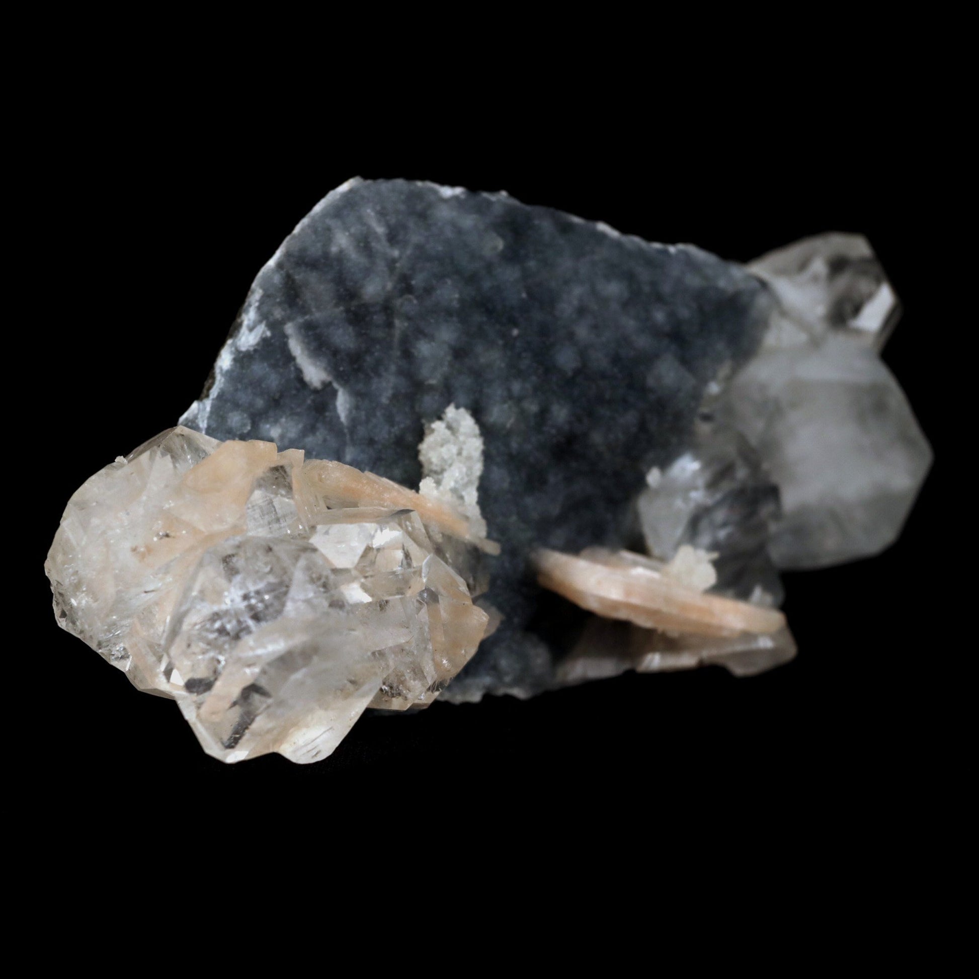 Apophyllite Cube with Stilbite on Chalcedony Natural Mineral Specimen …  https://www.superbminerals.us/products/apophyllite-cube-with-stilbite-on-chalcedony-natural-mineral-specimen-b-4916  Features: Beautiful, isolated, cubical, lustrous, gemmy, colorless / white crystals of Apophyllite sit beautifully on the sparkling black Chalcedony matrix. A few blades of Stilbite can be seen on the piece as well. Most of the Apophyllites are completely damage fee, and show such a lovely "wet" luster