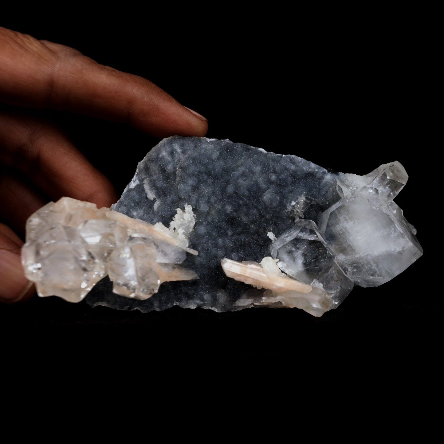 Apophyllite Cube with Stilbite on Chalcedony Natural Mineral Specimen …  https://www.superbminerals.us/products/apophyllite-cube-with-stilbite-on-chalcedony-natural-mineral-specimen-b-4916  Features: Beautiful, isolated, cubical, lustrous, gemmy, colorless / white crystals of Apophyllite sit beautifully on the sparkling black Chalcedony matrix. A few blades of Stilbite can be seen on the piece as well. Most of the Apophyllites are completely damage fee, and show such a lovely "wet" luster