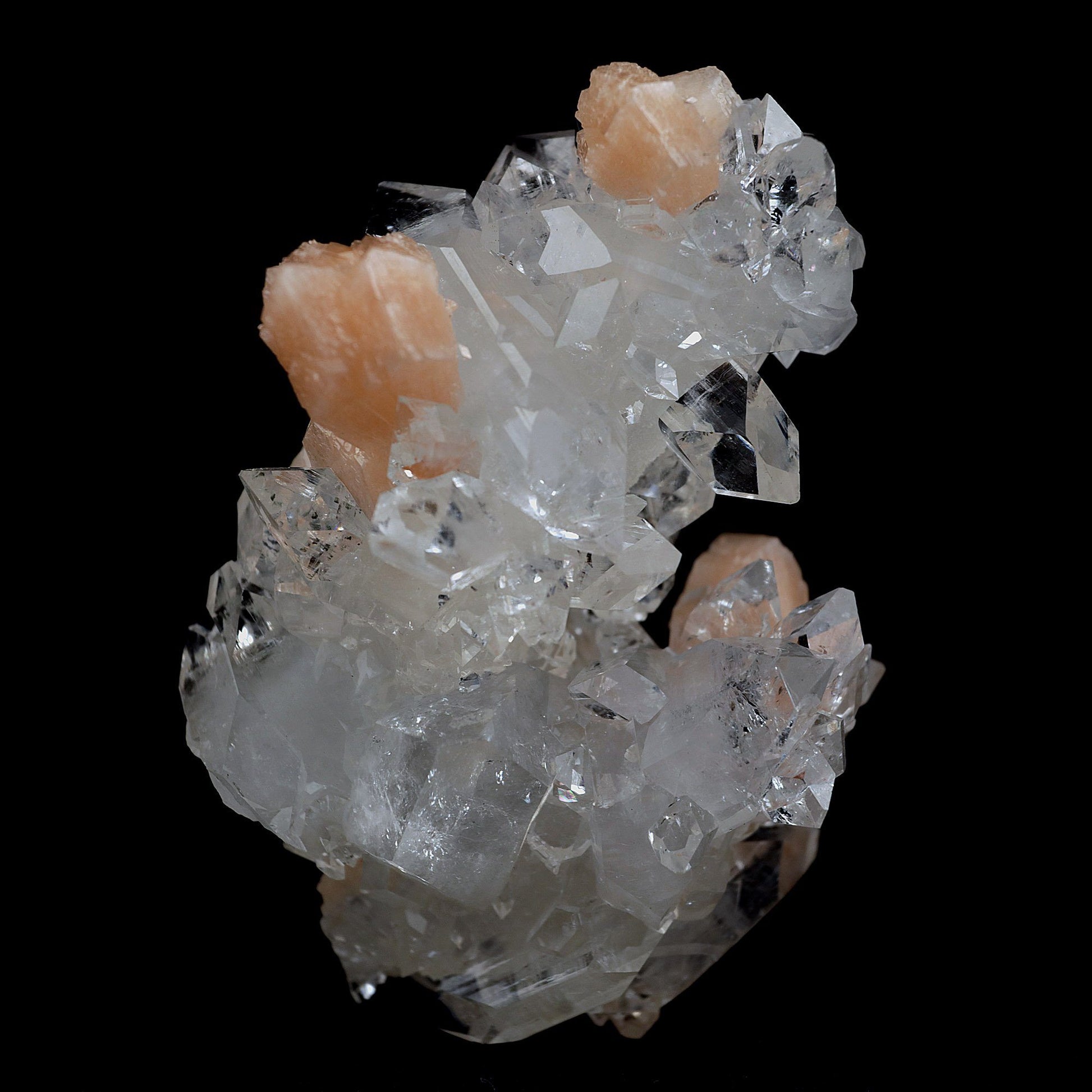 Apophyllite Gemmy Crystals with Stilbite Natural Mineral Specimen # B …  https://www.superbminerals.us/products/apophyllite-gemmy-crystals-with-stilbite-natural-mineral-specimen-b-4057  Features:Very fine classic Apophyllite specimen with Stilbite on Quartz from the Jalgaon area Deccan Trap flood Basalts. Sharply formed crystals of Apophyllite, displaying strong development of prism and pyramidal faces. Crystals of Apophyllite have pleasing colourless gemmy pyramidal areas, and translucent prism