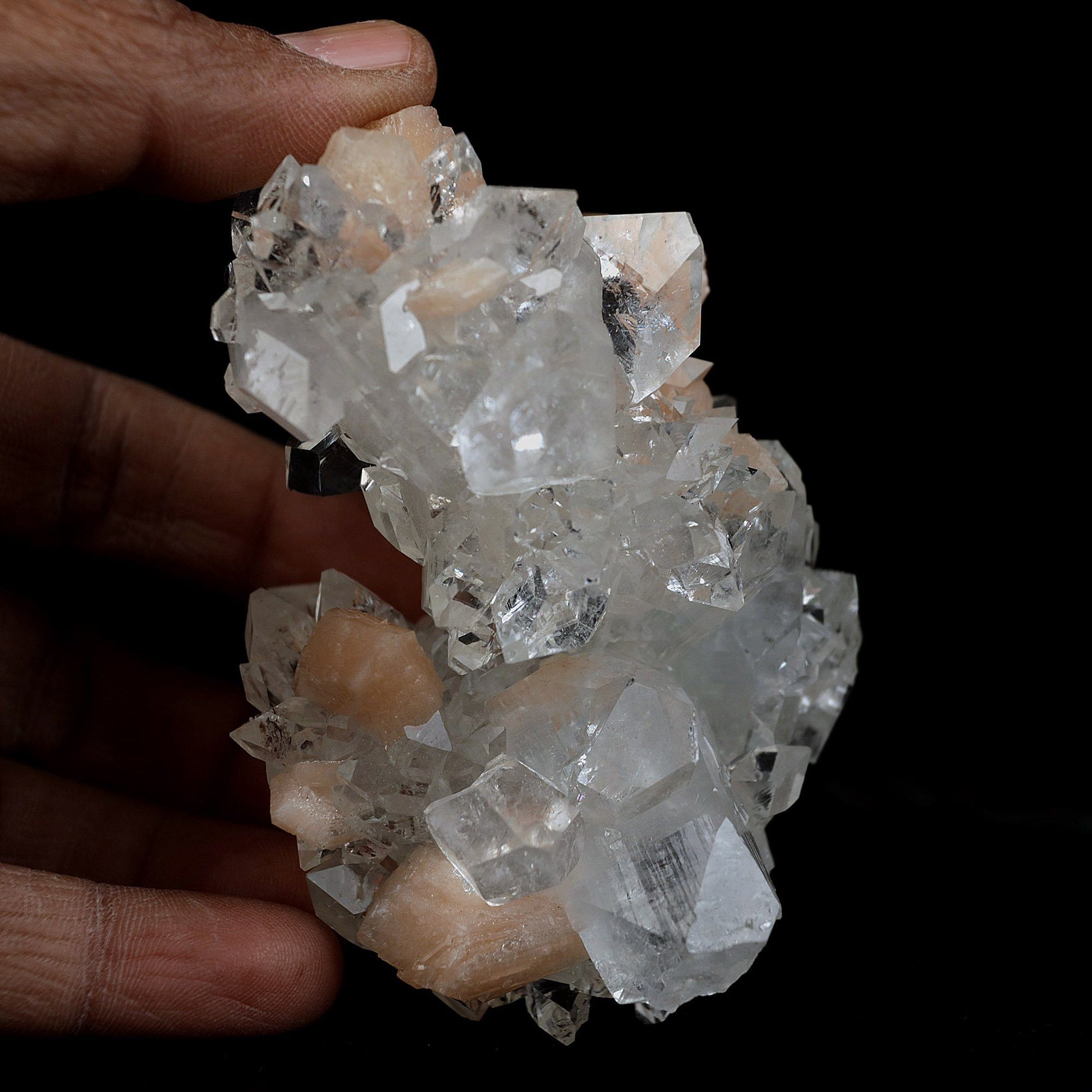 Apophyllite Gemmy Crystals with Stilbite Natural Mineral Specimen # B …  https://www.superbminerals.us/products/apophyllite-gemmy-crystals-with-stilbite-natural-mineral-specimen-b-4057  Features:Very fine classic Apophyllite specimen with Stilbite on Quartz from the Jalgaon area Deccan Trap flood Basalts. Sharply formed crystals of Apophyllite, displaying strong development of prism and pyramidal faces. Crystals of Apophyllite have pleasing colourless gemmy pyramidal areas, and translucent prism