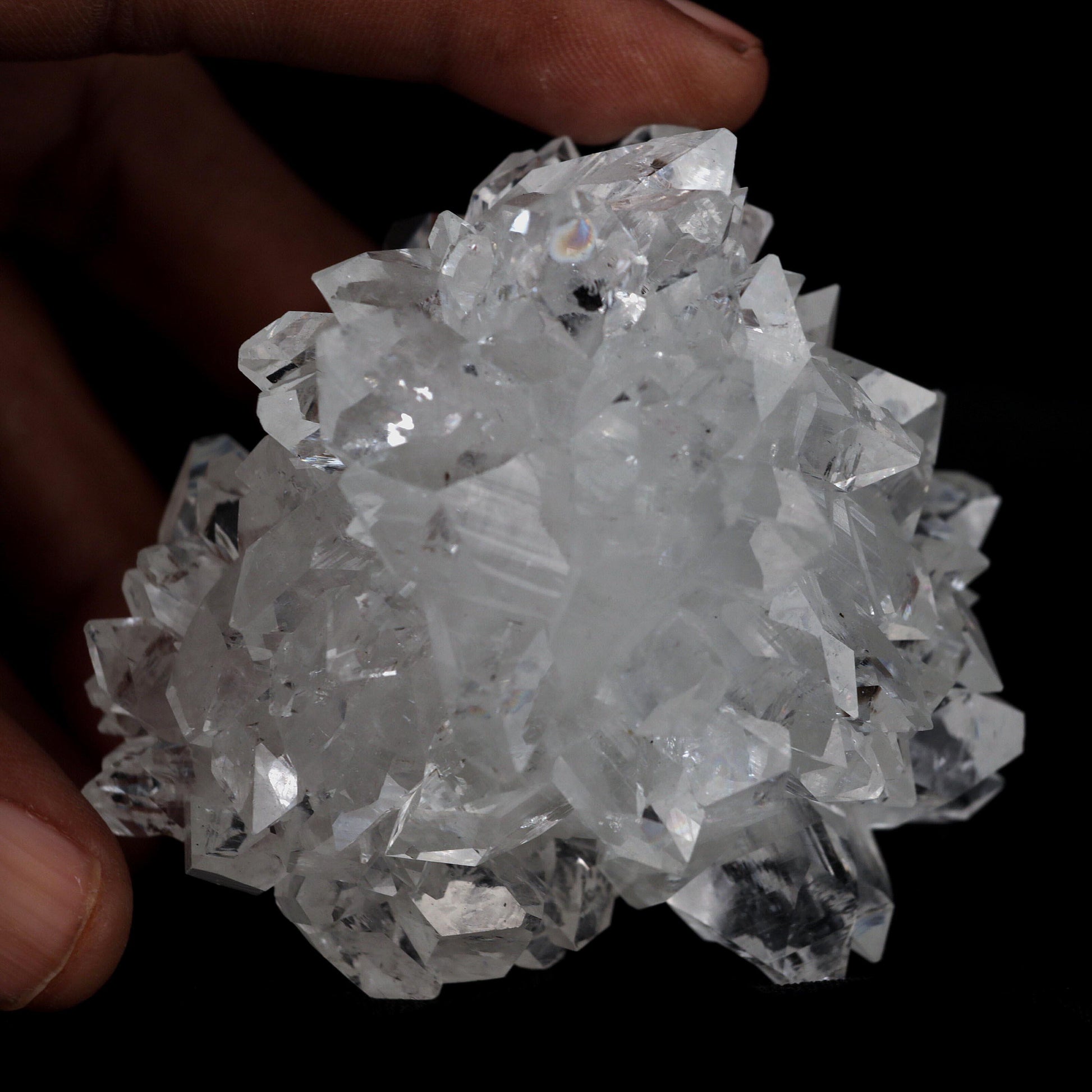 Apophyllite Gemmy Crystals with Stilbite Natural Mineral Specimen # B…  https://www.superbminerals.us/products/apophyllite-gemmy-crystals-with-stilbite-natural-mineral-specimen-b-4590  Features:A striking and beautiful apophyllite with stilbite stalactite. This remarkable specimen is highlighted by a stunning, sharply pyramidal apophyllite with a gem ending and a double terminated crystal. The tan stilbites provide a nice touch. This is one of the most sculptural and exquisite apophyllites 