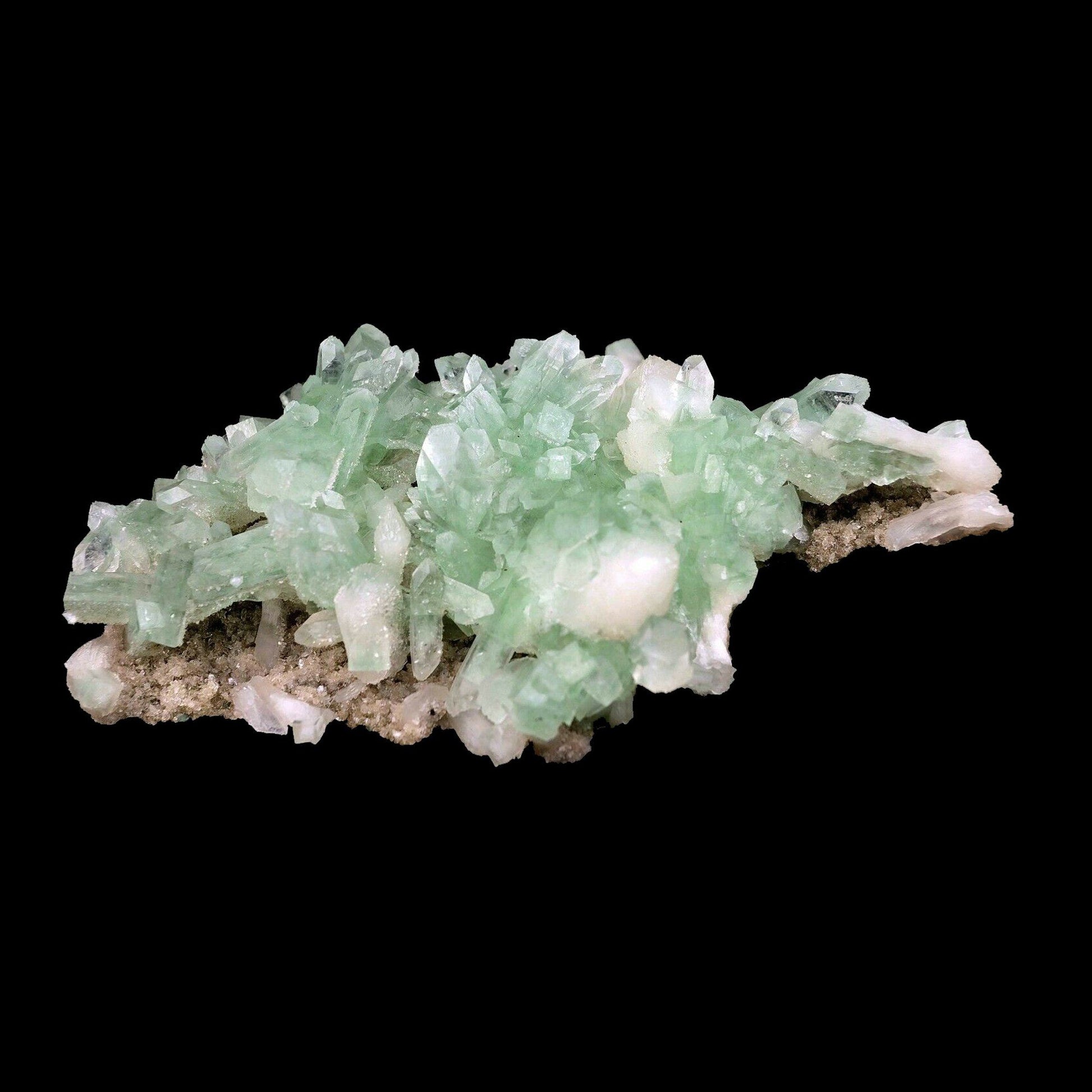 Apophyllite green crystal with Stilbite Natural Mineral Specimen # B 3…  https://www.superbminerals.us/products/apophyllite-green-crystal-with-stilbite-natural-mineral-specimen-b-3568  Features:A splendid green, light-green, radiant layer of Apophyllite precious stones with Stilbite on top of it which makes an ice impact . With a more intensive look, the precious stone development and shading contrast between the two ages of stilbite is insane. The mix, state of example and difference alongside