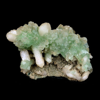 Apophyllite Green Crystal with Stilbite Natural Mineral Specimen # B 3571 https://www.superbminerals.us/products/apophyllite-green-crystal-with-stilbite-natural-mineral-specimen-b-3571 An extremely stylish piece that that is covered with light green Apophyllite precious stones. Set among the Apophyllite gems are various Stilbite gems, a few having a "tie" precious stone development. The silvery shine of this piece is extraordinary. You will see some uncovered lattice of beige-shaded microcry