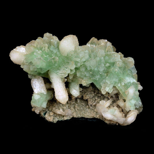 Apophyllite Green Crystal with Stilbite Natural Mineral Specimen # B 3571 https://www.superbminerals.us/products/apophyllite-green-crystal-with-stilbite-natural-mineral-specimen-b-3571 An extremely stylish piece that that is covered with light green Apophyllite precious stones. Set among the Apophyllite gems are various Stilbite gems, a few having a "tie" precious stone development. The silvery shine of this piece is extraordinary. You will see some uncovered lattice of beige-shaded microcry