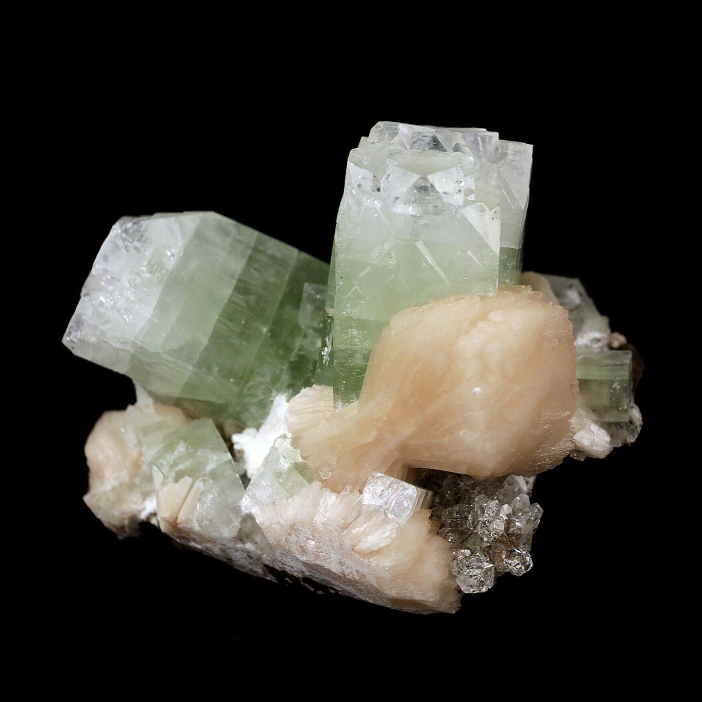 Apophyllite green crystal with Stilbite Natural Mineral Specimen # B 3…  https://www.superbminerals.us/products/apophyllite-green-crystal-with-stilbite-natural-mineral-specimen-b-3607  Features:Two large, green apophyllite cubes in 'V' formation with strong green shade. along with pink Stilbite bow shape formation. Primary Mineral(s): ApophylliteSecondary Mineral(s): StilbiteMatrix: N/A12 cm x 9 cm860 GmsLocality: Nashik, Maharashtra, IndiaYear of Discovery: 2020