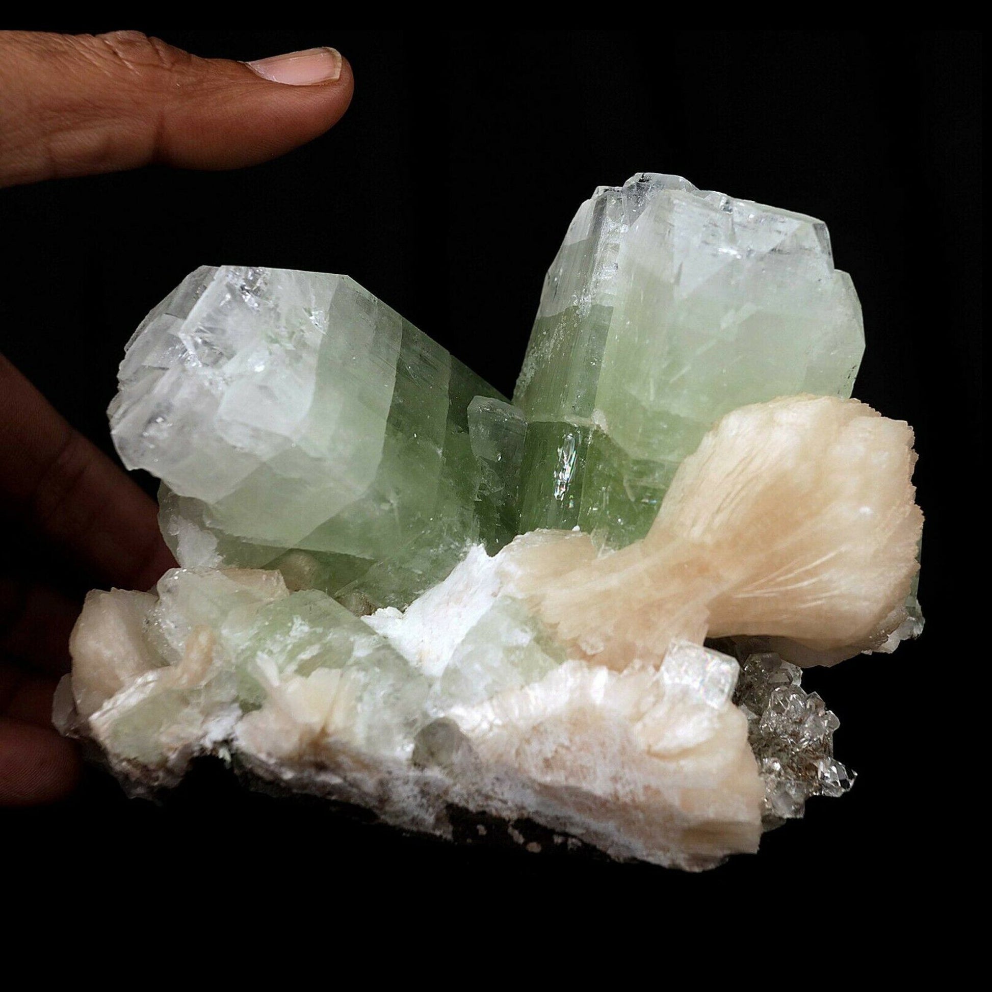 Apophyllite green crystal with Stilbite Natural Mineral Specimen # B 3…  https://www.superbminerals.us/products/apophyllite-green-crystal-with-stilbite-natural-mineral-specimen-b-3607  Features:Two large, green apophyllite cubes in 'V' formation with strong green shade. along with pink Stilbite bow shape formation. Primary Mineral(s): ApophylliteSecondary Mineral(s): StilbiteMatrix: N/A12 cm x 9 cm860 GmsLocality: Nashik, Maharashtra, IndiaYear of Discovery: 2020