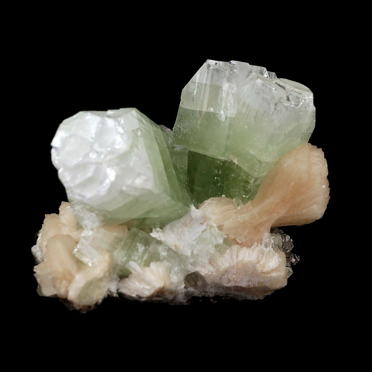 Apophyllite green crystal with Stilbite Natural Mineral Specimen # B 3…  https://www.superbminerals.us/products/apophyllite-green-crystal-with-stilbite-natural-mineral-specimen-b-3607  Features:Two large, green apophyllite cubes in 'V' formation with strong green shade. along with pink Stilbite bow shape formation. Primary Mineral(s): ApophylliteSecondary Mineral(s): StilbiteMatrix: N/A12 cm x 9 cm860 GmsLocality: Nashik, Maharashtra, IndiaYear of Discovery: 2020