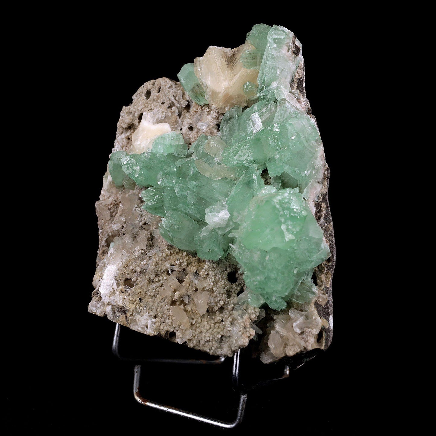 Apophyllite Green Crystal with Stilbite Natural Mineral Specimen # B3716 https://www.superbminerals.us/products/apophyllite-green-crystal-with-stilbite-natural-mineral-specimen-b-3716 A very aesthetic piece featuring a matrix densely coated with miniature, Stilbite crystals with a couple of lustrous, larger light Stilbite crystals on matrix, all hosting a line of transparent, mint-green Apophyllite pseudocubic (rectangular) crystals ascending to the top of the piece. Great contrast,