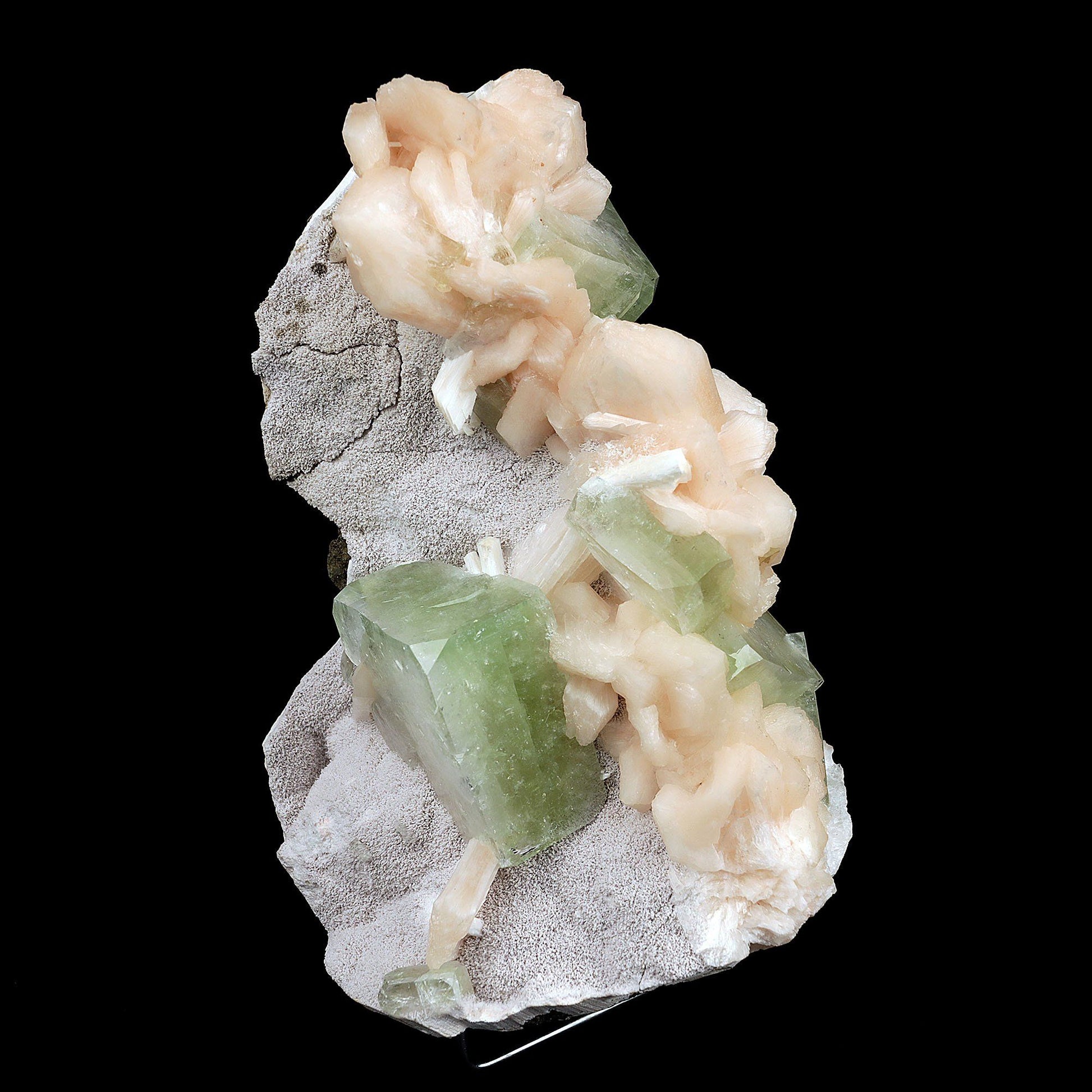 Apophyllite Green Cubes with Stilbite Natural Mineral Specimen # B 371…  https://www.superbminerals.us/products/apophyllite-green-cubes-with-stilbite-natural-mineral-specimen-b-3718  Features:A very aesthetic piece featuring a matrix densely coated with miniature, beige Stilbite crystals with a cluster of lustrous, larger light-beige Stilbite crystals at the base, all hosting a crown of transparent, mint-green Apophyllite pseudocubic (rectangular) crystals. Great contrast, color, symmetry and luste