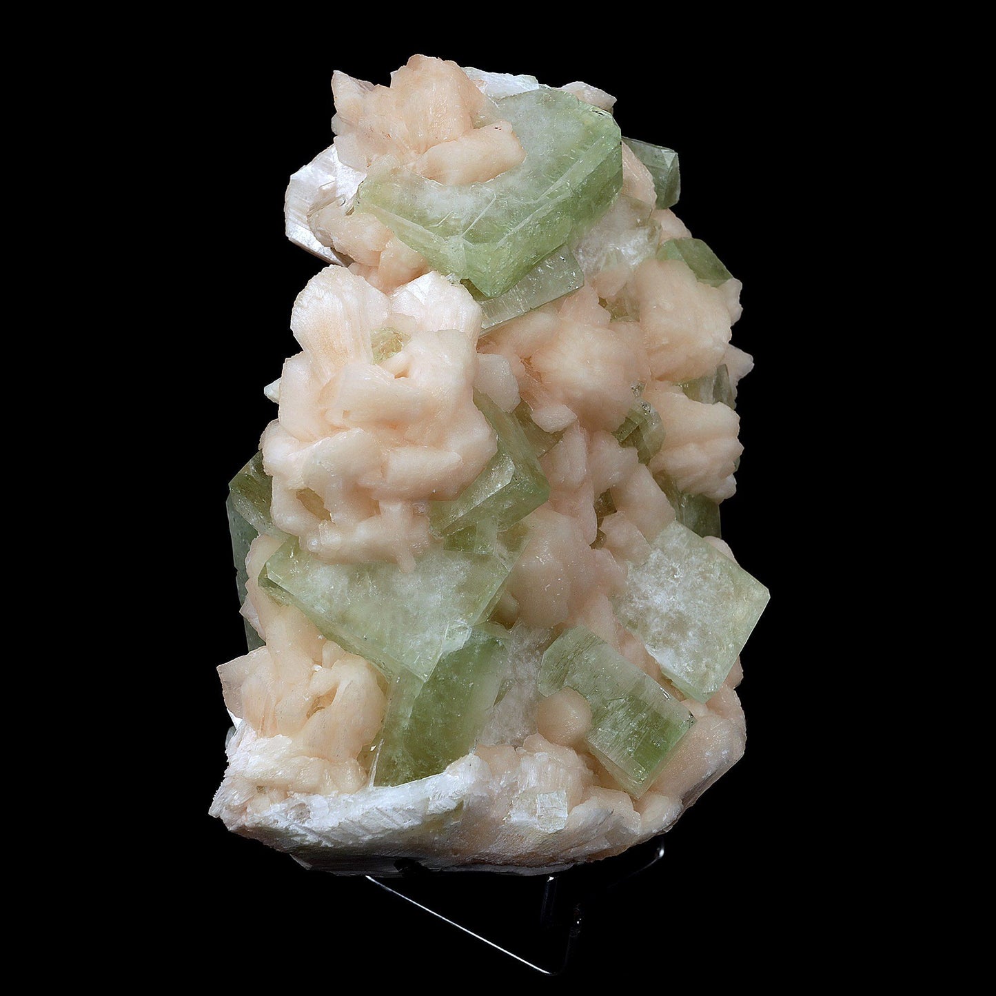 Apophyllite Green Cubes with Stilbite Natural Mineral Specimen # B 371…  https://www.superbminerals.us/products/apophyllite-green-cubes-with-stilbite-natural-mineral-specimen-b-3718  Features:A very aesthetic piece featuring a matrix densely coated with miniature, beige Stilbite crystals with a cluster of lustrous, larger light-beige Stilbite crystals at the base, all hosting a crown of transparent, mint-green Apophyllite pseudocubic (rectangular) crystals. Great contrast, color, symmetry and luste