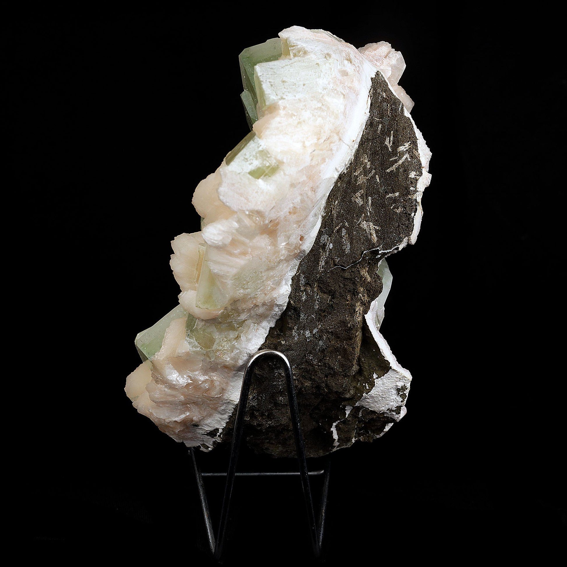 Apophyllite Green Cubes with Stilbite Natural Mineral Specimen # B 371…  https://www.superbminerals.us/products/apophyllite-green-cubes-with-stilbite-natural-mineral-specimen-b-3718  Features:A very aesthetic piece featuring a matrix densely coated with miniature, beige Stilbite crystals with a cluster of lustrous, larger light-beige Stilbite crystals at the base, all hosting a crown of transparent, mint-green Apophyllite pseudocubic (rectangular) crystals. Great contrast, color, symmetry and luste