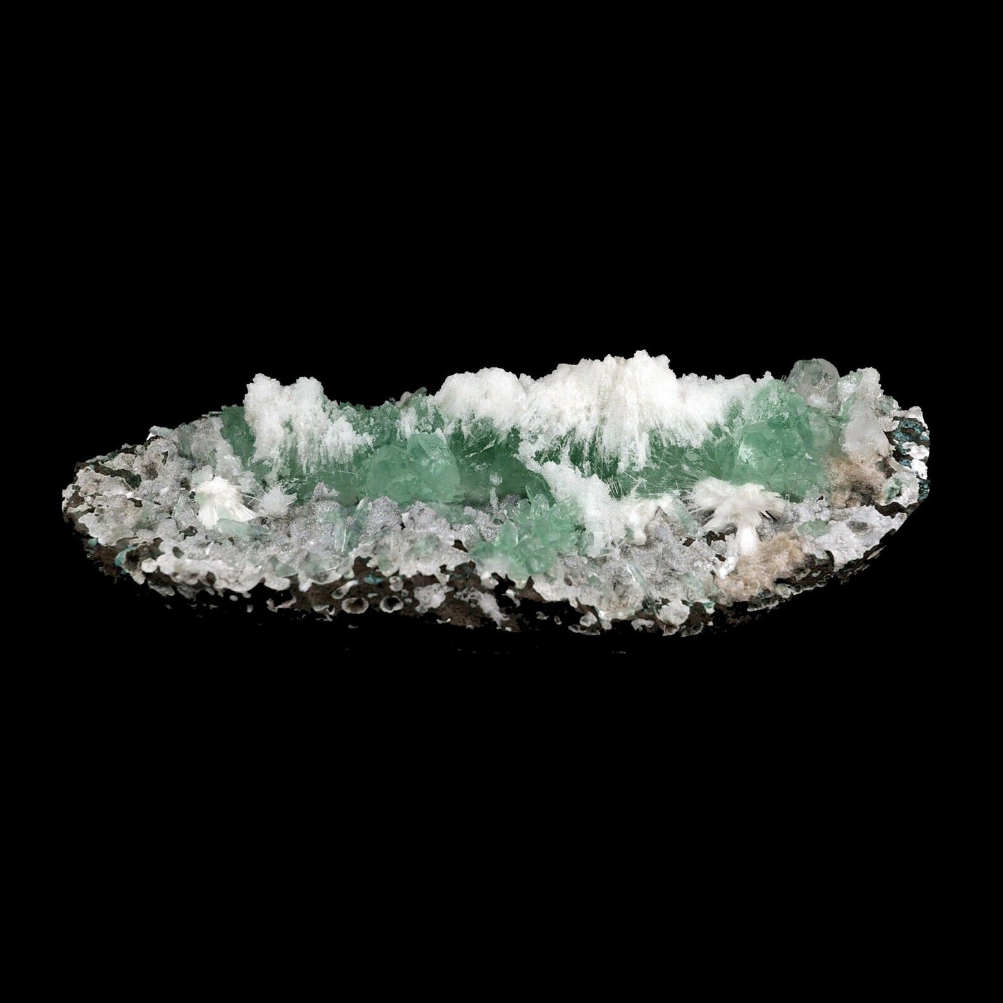 Apophyllite Green with Scolecite on Chalcedony Attention Grabber # B 3…  https://www.superbminerals.us/products/apophyllite-green-with-scolecite-on-chalcedony-attaintion-graber-b-3744  Features:A very aesthetic piece featuring a matrix densely coated with miniature, sparkling mint crystals with a numerous of lustrous, larger light-green to green Apophyllite crystals on white chalcedony matrix, all hosting a line of transparent, mint-green Apophyllite pointed crystals ascending to the top of the piece