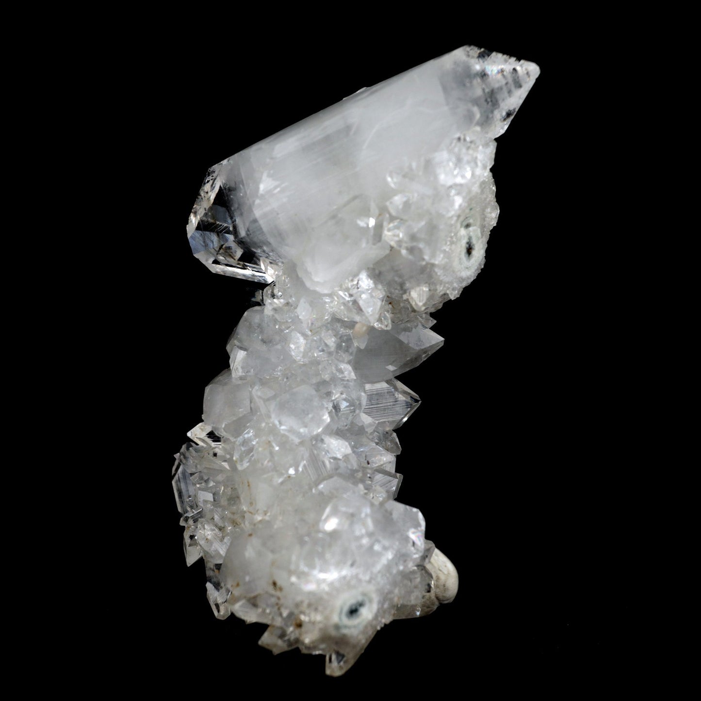 Apophyllite Pointed Big Crystal on MM Quartz Natural Mineral Specimen …  https://www.superbminerals.us/products/apophyllite-pointed-big-crystal-on-mm-quartz-natural-mineral-specimen-b-3926  FeaturesA bright white, microcrystalline Quartz with lustrous layer of Apophyllite crystals. The combination and contrast along with the luster, color and crystal formation is outstanding.&nbsp;Primary Mineral(s):&nbsp; ApophylliteSecondary Mineral(s): MM Quartz