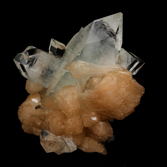 Apophyllite Pointed with Stilbite Natural Mineral Specimen # B 5098  https://www.superbminerals.us/products/apophyllite-pointed-with-stilbite-natural-mineral-specimen-b-5098  Features: A classic and aesthetic display specimen featuring sharp, lustrous, very well-formed, beautiful orange-peach colored, thick "sword"-shaped sheaf-like crystals of Stilbite&nbsp; across sitting atop&nbsp; of Apophyllite matrix with a distinct pinkish coloring internally. The main Stilbite crystal is doubly