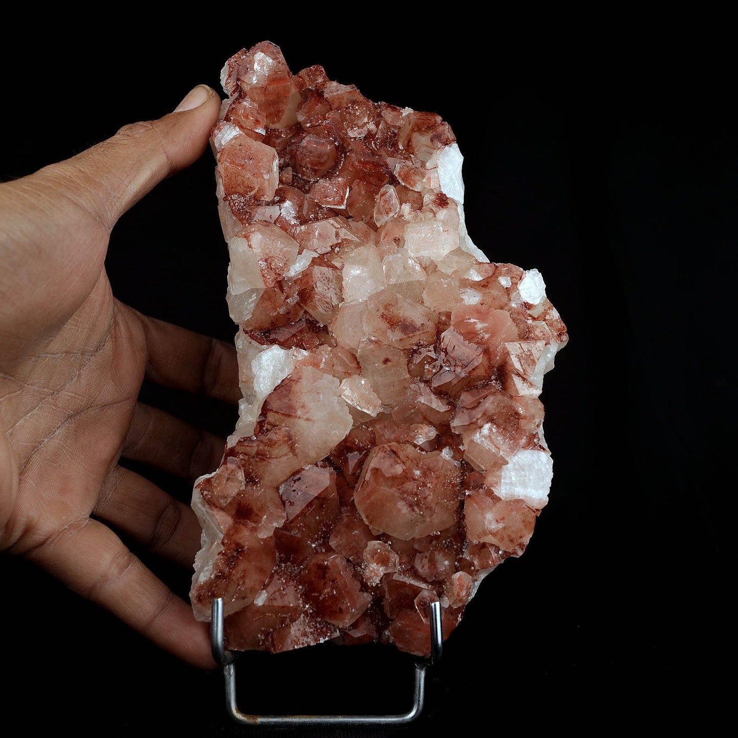Apophyllite red cluster Natural Mineral Specimen # B 3715  https://www.superbminerals.us/products/apophyllite-red-cluster-natural-mineral-specimen-b-3715  Features:A lovely little Apophyllite Hematite Cluster makes it red apophyllite.&nbsp; This specimen is in top condition and makes for a very aesthetic and compact display piece.&nbsp; Several crystal shapes appear on the cluster and this is a more unusual form of the mineral, with the hematite inclusions in the Apophy