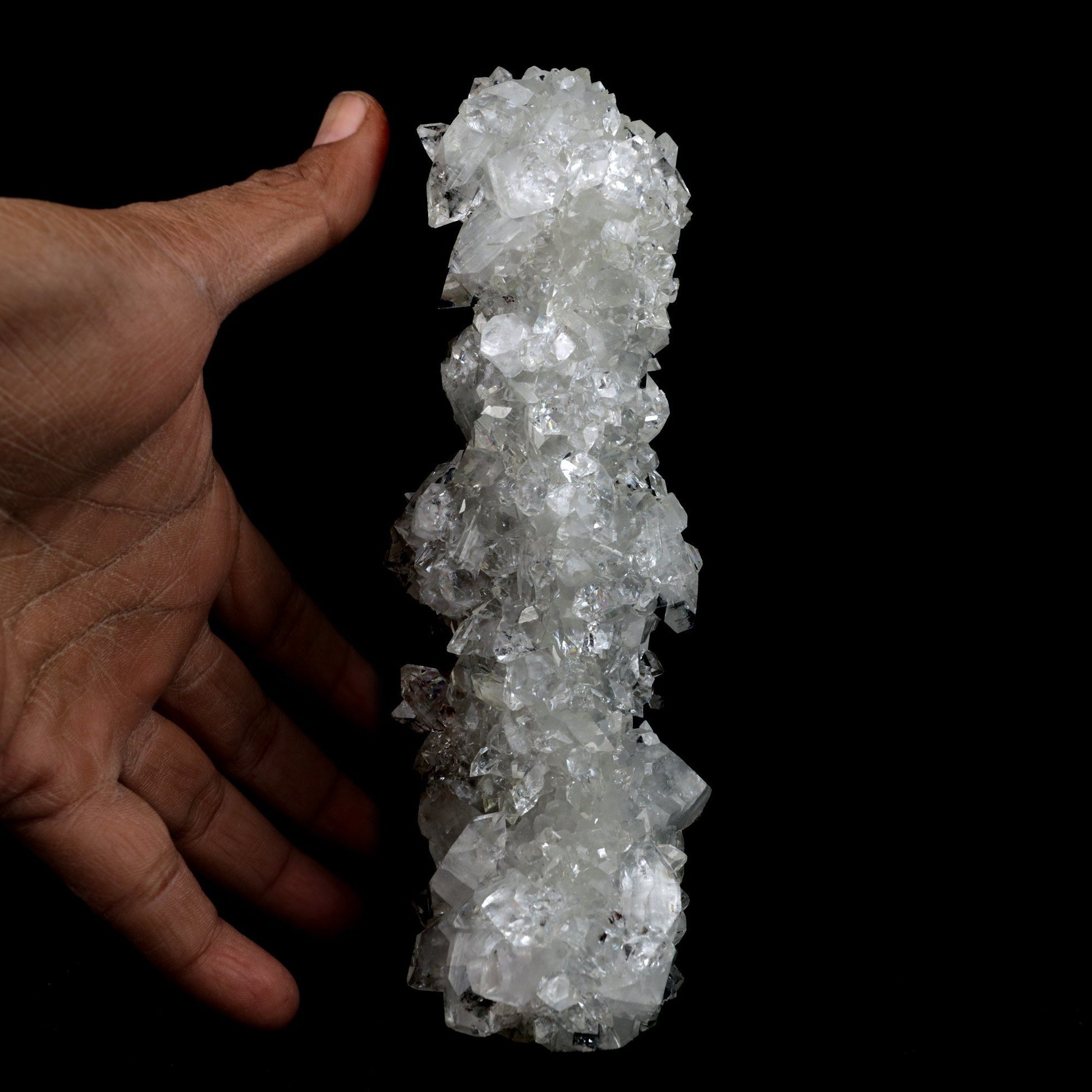 Apophyllite Sparkling Crystal Stalactite Natural Mineral Specimen # B …  https://www.superbminerals.us/products/apophyllite-sparkling-crystal-stalactite-natural-mineral-specimen-b-3913  FeaturesA splendid white, microcrystalline Apophyllite underground rock formation mostly covered with a glistening layer of Apophyllite crystals. The mix and differentiation alongside the radiance, shading and crystal development is remarkable. A striking and tasteful piece in superb condition.