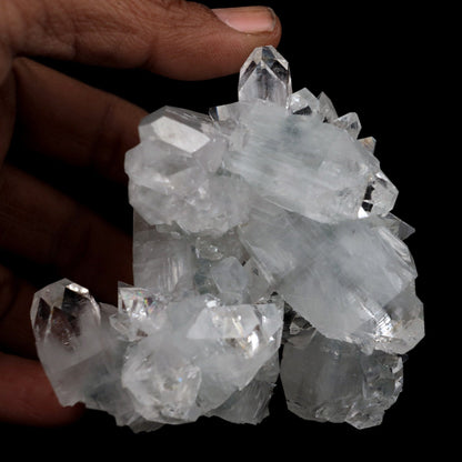 Apophyllite Terminated Sparkling Crystal Natural Mineral Specimen # B …  https://www.superbminerals.us/products/apophyllite-terminated-sparkling-crystal-natural-mineral-specimen-b-3928  FeaturesThis is a beautifully balanced and aesthetic specimen of water clear, transparent Apophyllite. Positioned perfectly in the center of a mass of lustrous Apophyllite crystals, is a large, perfect pyramidal Apophyllite crystal. This piece really stands out, is a great show piece, and has no damage