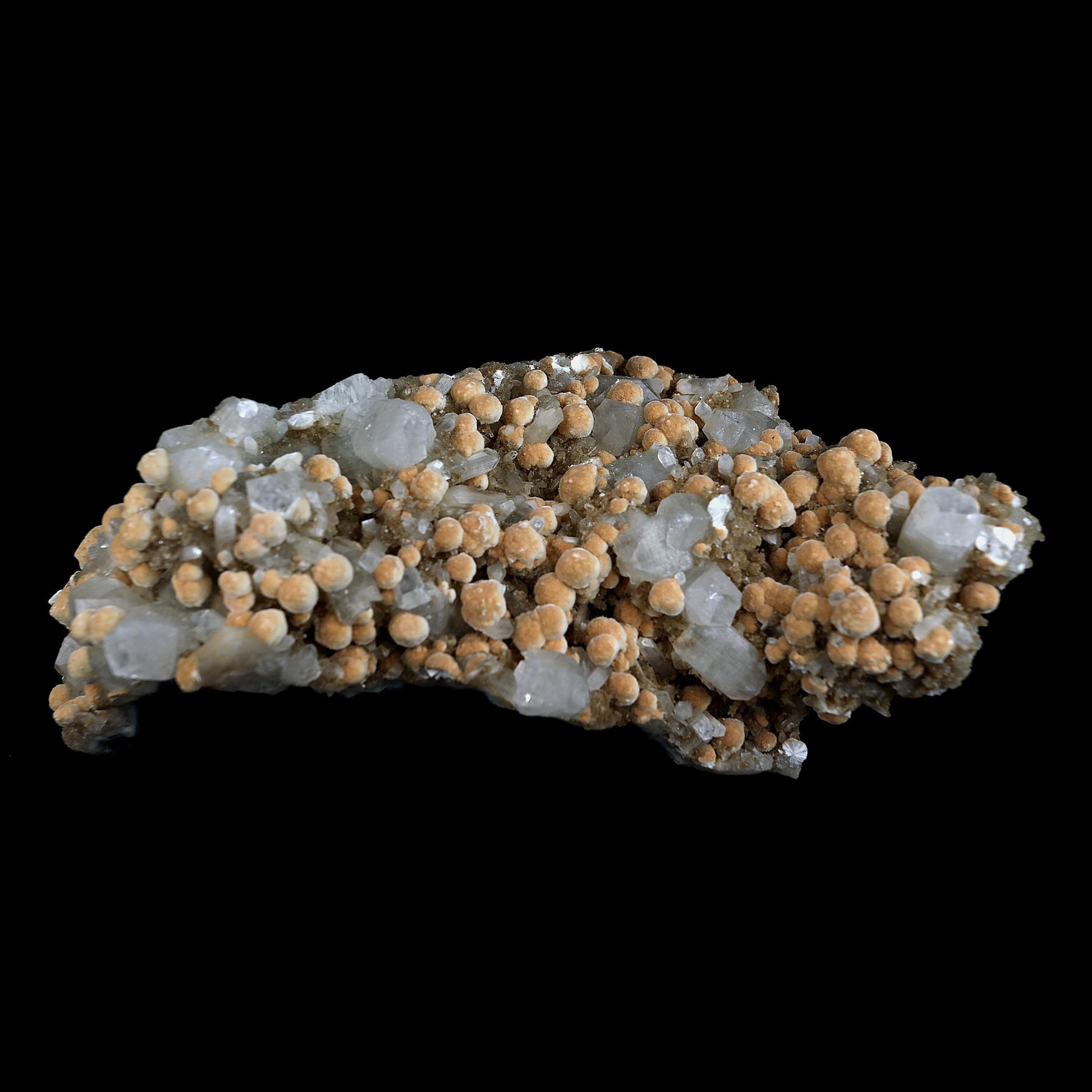 Apophyllite with Okenite Balls Natural Mineral Specimen # B 4549  https://www.superbminerals.us/products/apophyllite-with-okenite-balls-natural-mineral-specimen-b-4549  Features:India has always been the source of excellent okenite specimens. There are very few quarries in India that are producing fresh material these days.Due to the way it forms spherical "puff ball"-like groupings, this mineral has one of the most unique looks out of any species. Because they bruise