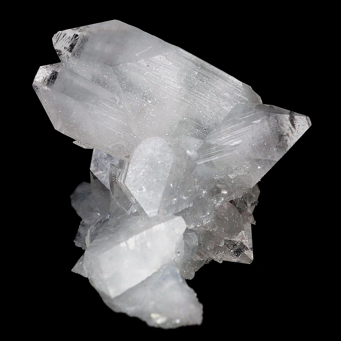 Artistic Pointed Apohyllite Cluster Natural Mineral Specimen # B 4151  https://www.superbminerals.us/products/artistic-pointed-apohyllite-cluster-natural-mineral-specimen-b-4151  Features: Beautiful gem Apophyllite crystals decorated by pointed miniature Apophyllite crystals. Apophyllite is the most desirable mineral from the Deccan Traps of India. It displays superb colorless gemmy pyramidal crystals. They have razor sharp octahedral shape. The crystals have glassy luster and pretty striations