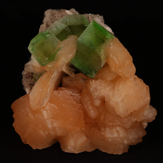 Bi-colored Fluorapophyllite and Stilbite Natural Mineral Specimen # B…  https://www.superbminerals.us/products/green-apophyllite-cubic-crystal-with-stilbite-natural-mineral-specimen-b-5077  Features: A striking, large blocky, color-zoned apophyllite crystal aesthetically flanked by similar smaller crystals dramatically highlights this impressive large mounded combination from recent finds in Jalgaon. The glassy, translucent tetragonal apophyllites have rich mint-green centers and colorless terminations 
