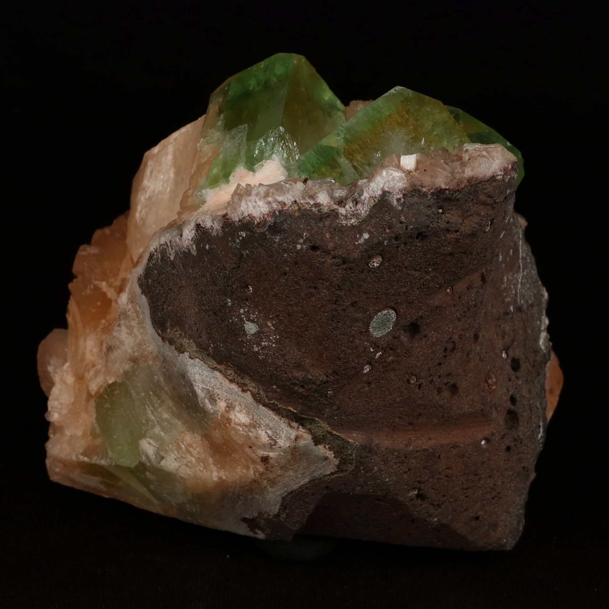 Bi-colored Fluorapophyllite and Stilbite Natural Mineral Specimen # B…  https://www.superbminerals.us/products/green-apophyllite-cubic-crystal-with-stilbite-natural-mineral-specimen-b-5077  Features: A striking, large blocky, color-zoned apophyllite crystal aesthetically flanked by similar smaller crystals dramatically highlights this impressive large mounded combination from recent finds in Jalgaon. The glassy, translucent tetragonal apophyllites have rich mint-green centers and colorless terminations 
