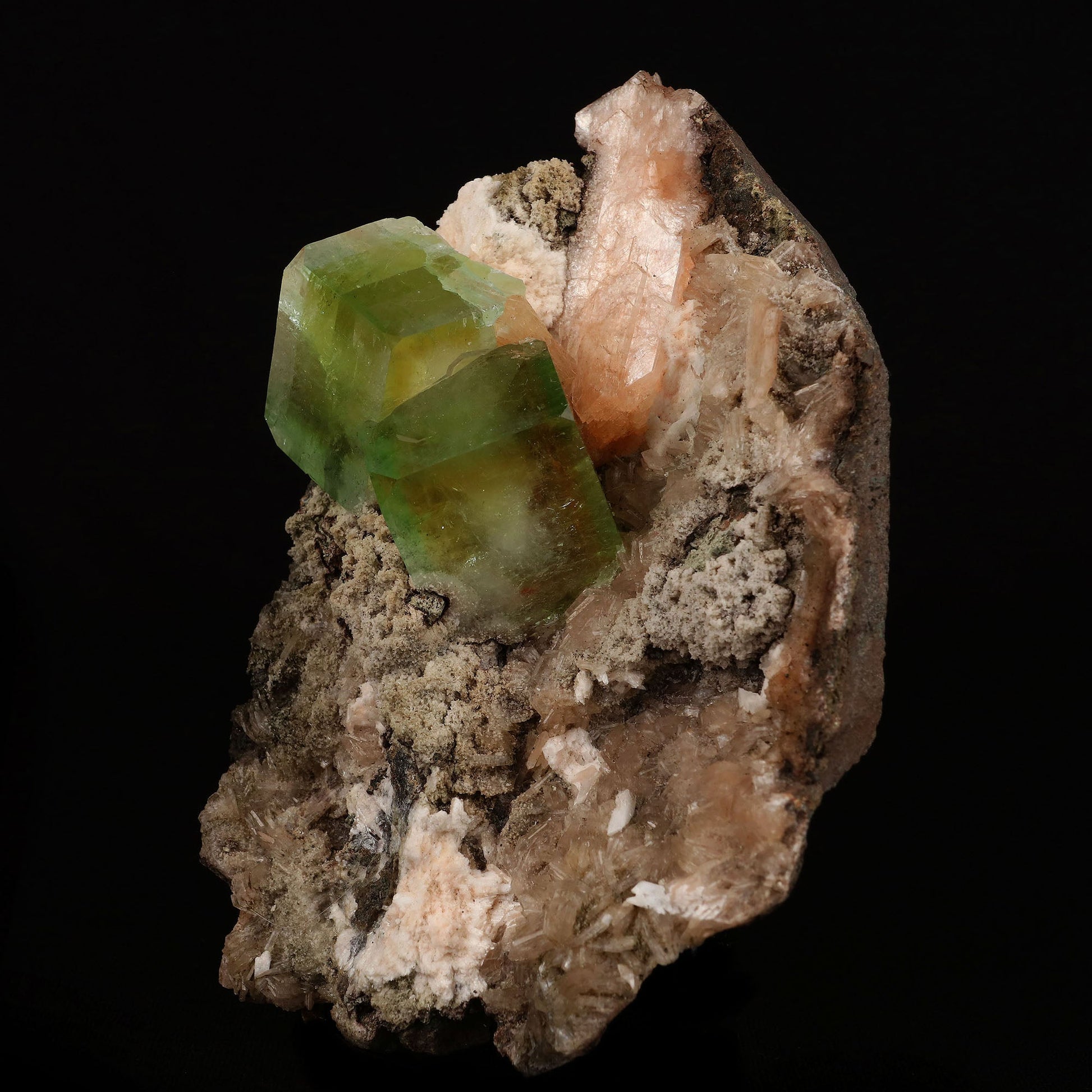 Bi-colored Fluorapophyllite and Stilbite Natural Mineral Specimen # B…  https://www.superbminerals.us/products/bi-colored-fluorapophyllite-and-stilbite-natural-mineral-specimen-b-5084  Features: A striking, large blocky, color-zoned apophyllite crystal aesthetically flanked by similar smaller crystals dramatically highlights this impressive large mounded combination from recent finds in Jalgaon. The glassy, translucent tetragonal apophyllites have rich mint-green centers and colorless terminations